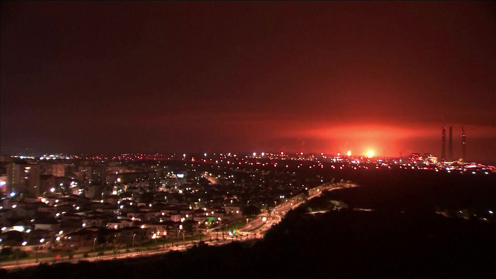 Explosions in Gaza are seen from the Israel-Gaza border, in Southern Israel, on October 27.