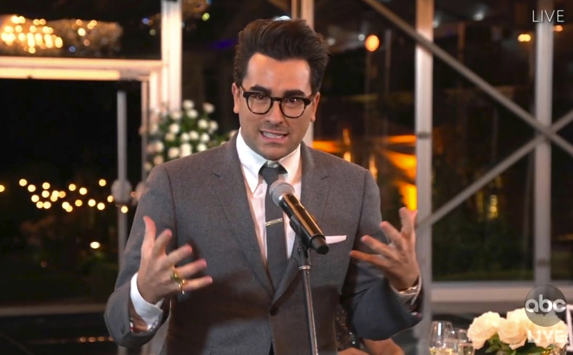 In this video grab captured on Sept. 20, 2020, courtesy of the Academy of Television Arts & Sciences and ABC Entertainment, Daniel Levy accepts the award for outstanding writing for a comedy series for "Schitt's Creek" during the 72nd Emmy Awards broadcast. 