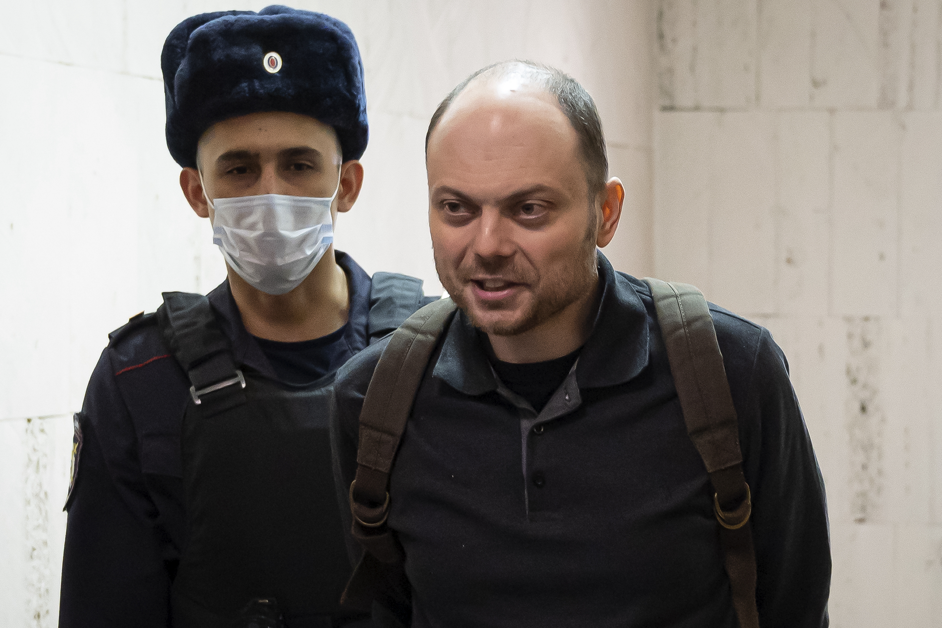 Russian opposition politician Vladimir Kara-Murza is escorted to a hearing in a court in Moscow, Russia, February 8, 2023.