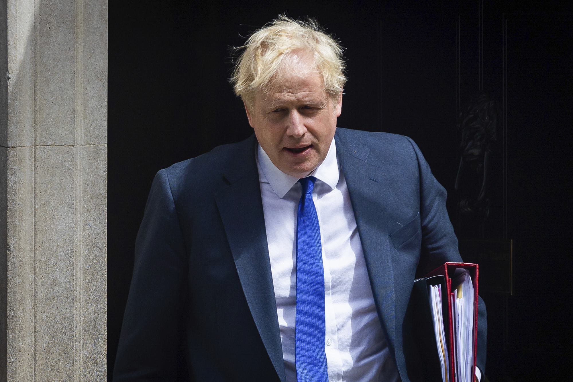 British Prime Minister Boris Johnson leaves Downing Street, London, on July 6.