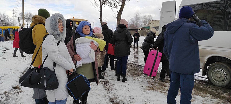 Residents evacuate from Sumy, Ukraine, on March 8.
