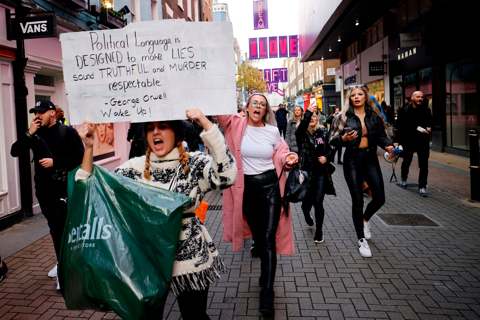 Anti-lockdown protesters march through central London on November 28.