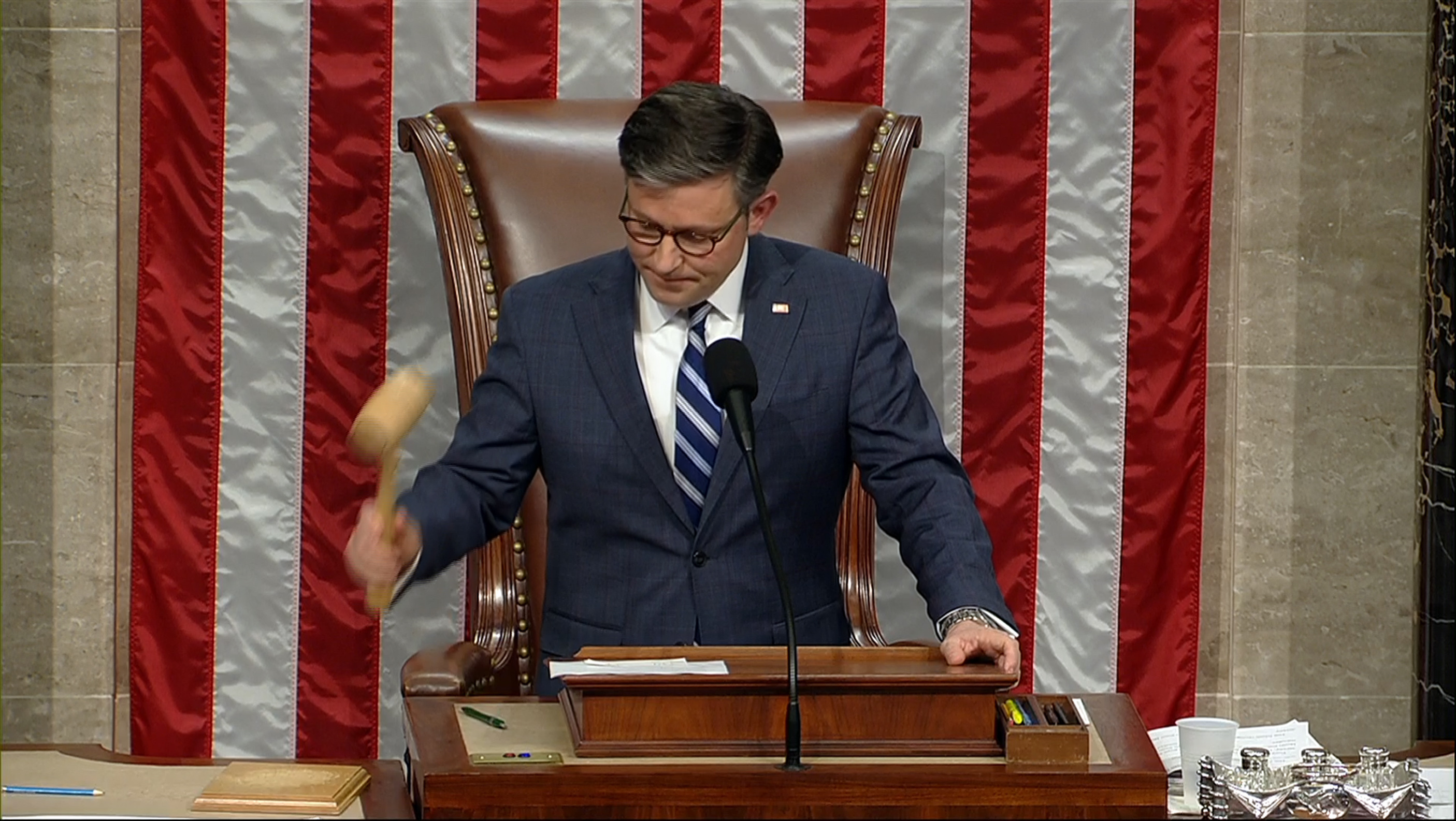 This image from House Television shows House Speaker Mike Johnson banging the gavel after he announced the House voted to impeach Homeland Security Secretary Alejandro Mayorkas at the US Capitol on Tuesday in Washington.