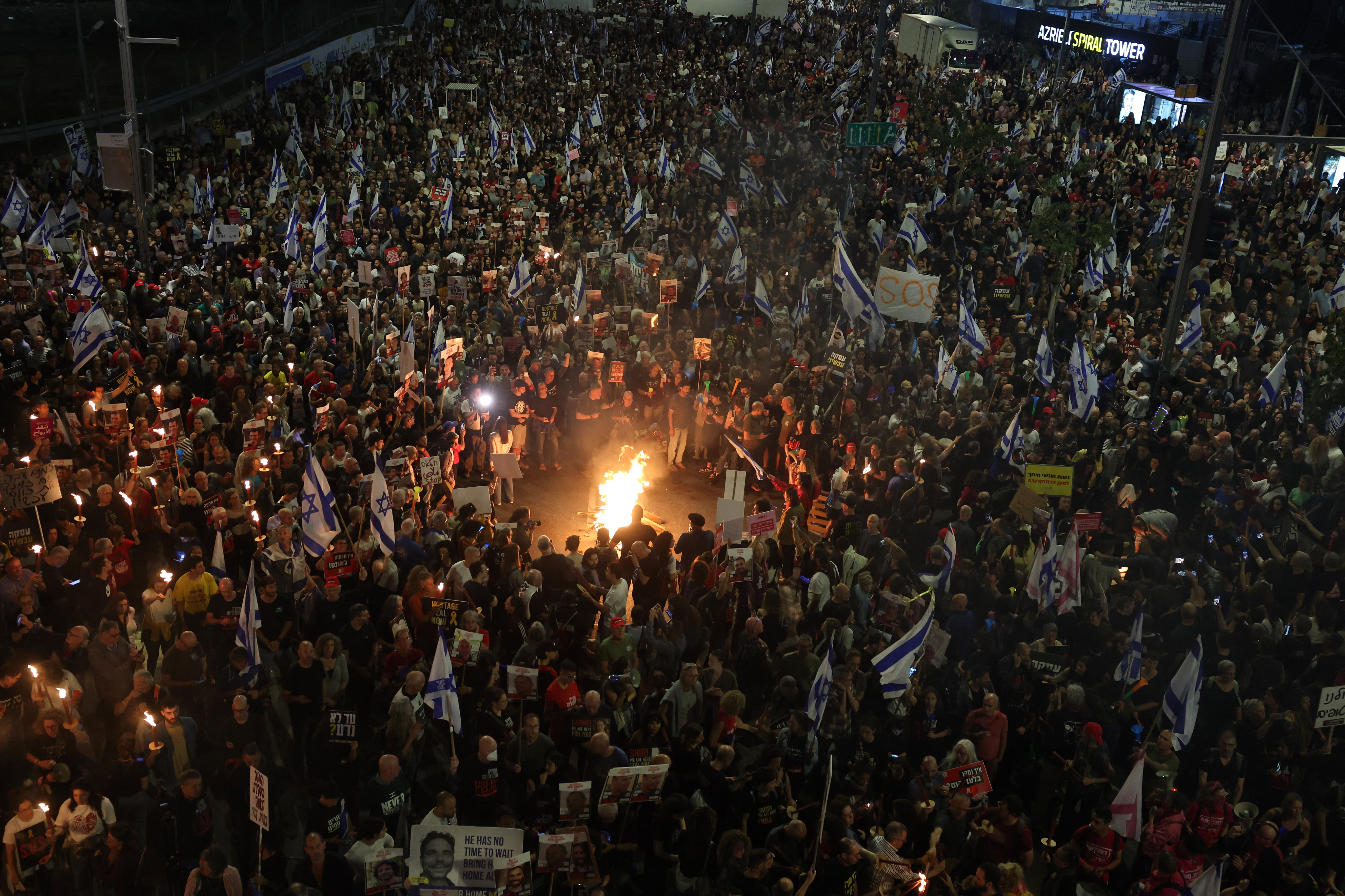 People gather in Tel Aviv, Israel, during a protest for Israeli hostages held in Gaza on March 30.