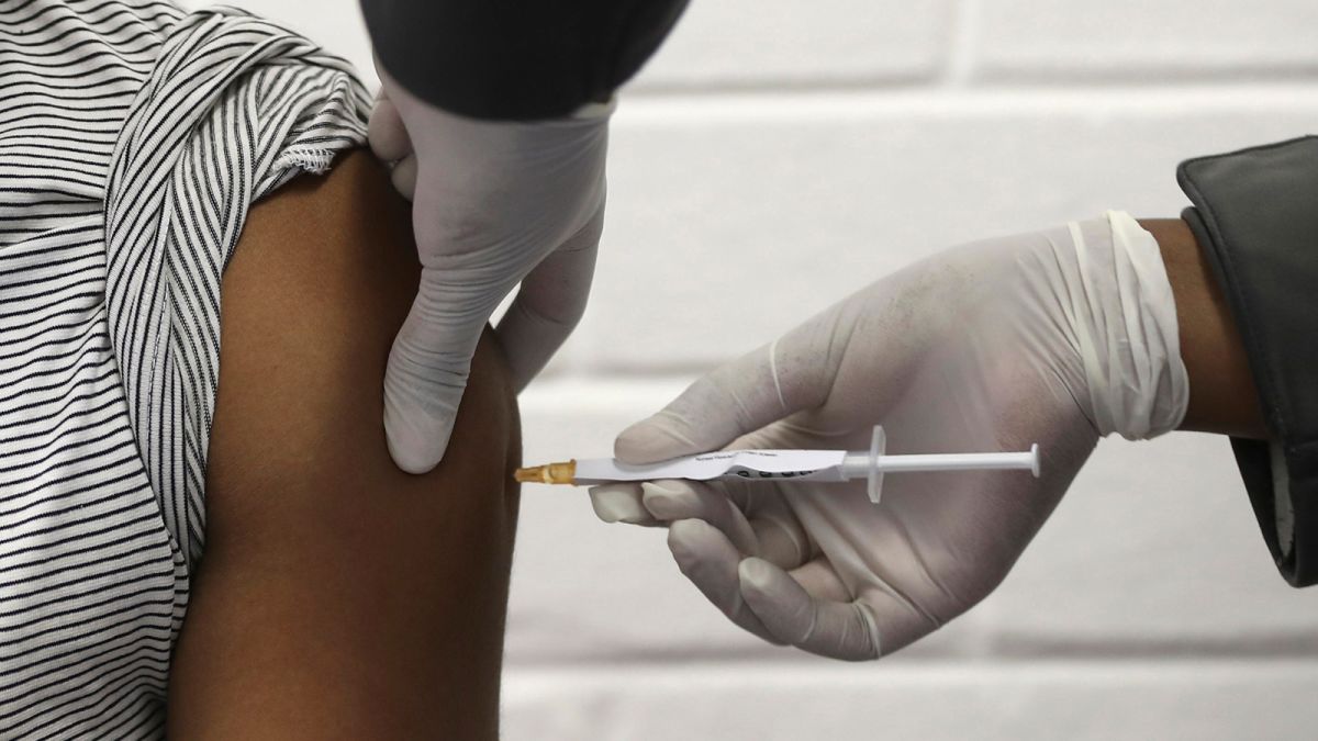 A volunteer receives an injection at the Chris Hani Baragwanath hospital on the outskirts of Johannesburg, on June 24 as part of South Africa's first participation in an Oxford/AstraZeneca vaccine trial. 