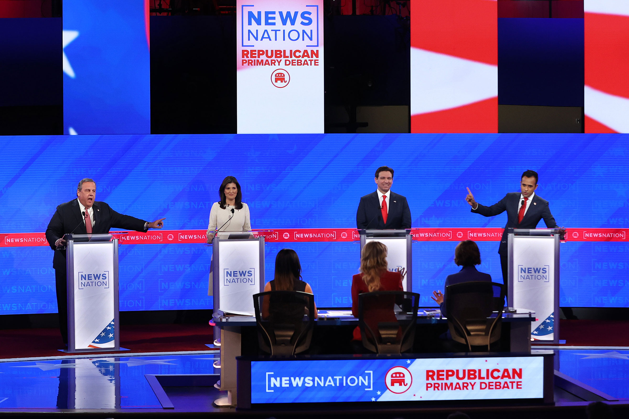 Republican presidential candidates former New Jersey Gov. Chris Christie, former UN Ambassador Nikki Haley, Florida Gov. Ron DeSantis and Vivek Ramaswamy participate in the NewsNation Republican Presidential Primary Debate at the University of Alabama Moody Music Hall on December 6, in Tuscaloosa.