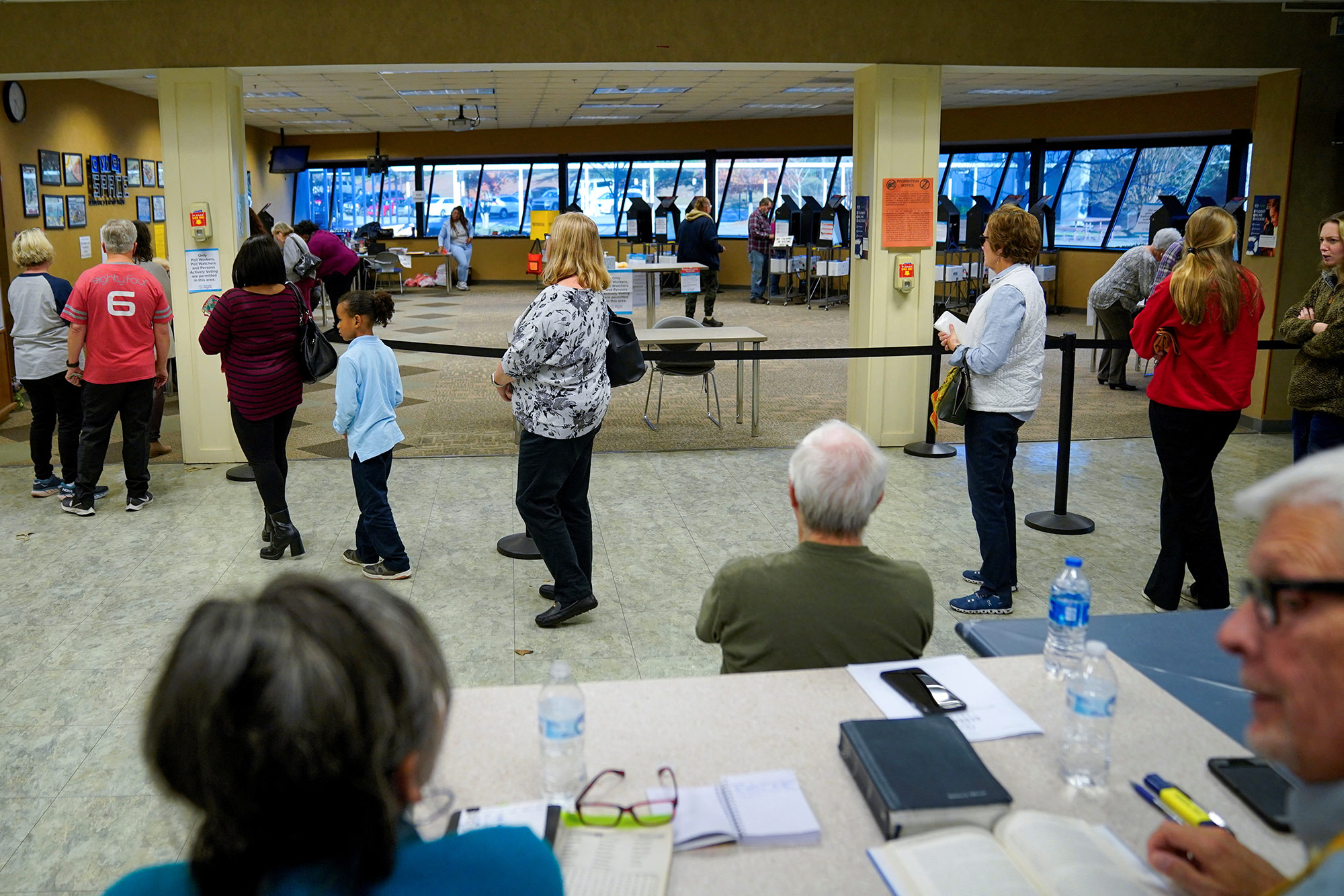 Voters wait to cast their ballots for the Georgia Senate runoff on November 28, in Columbus, Georgia. 