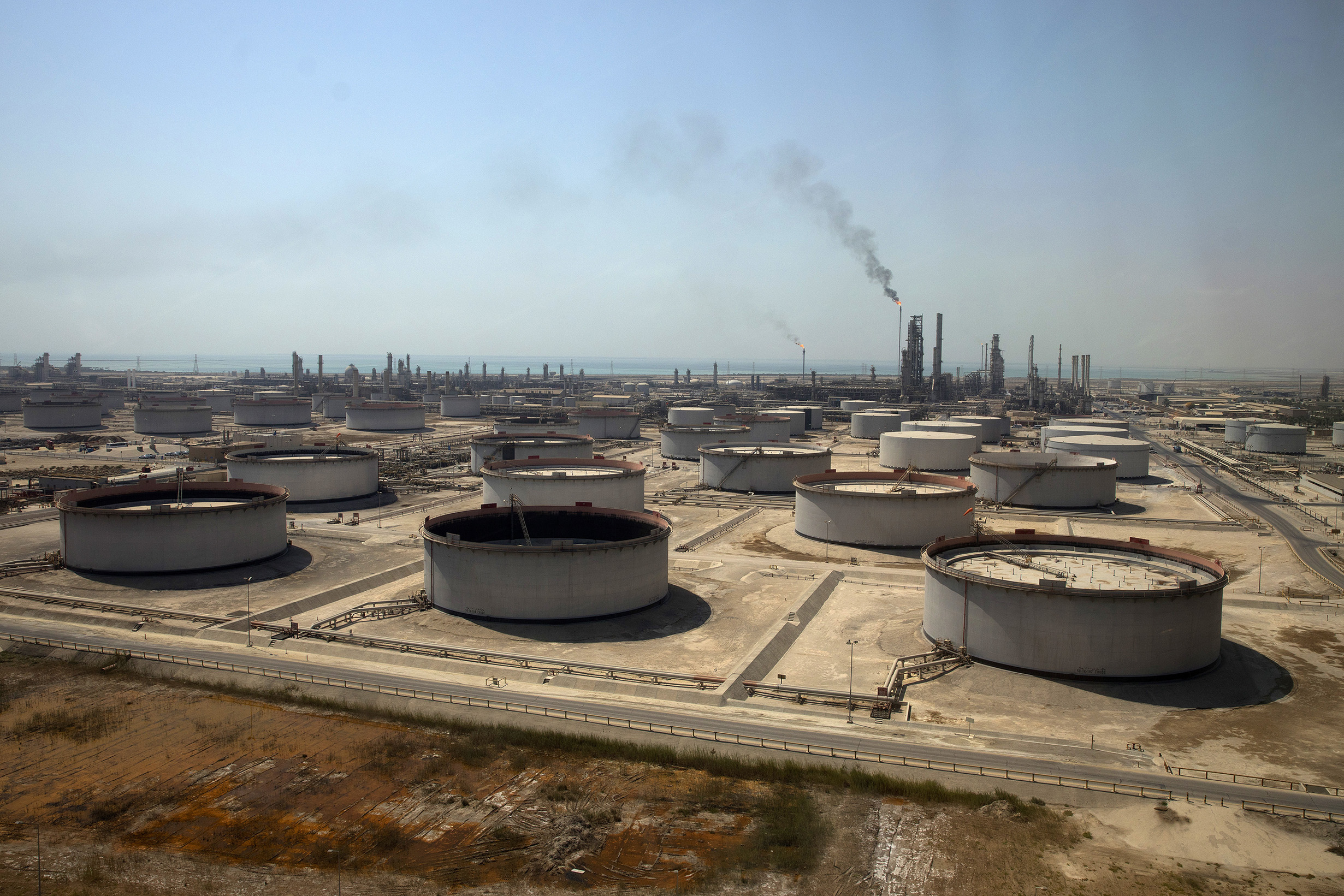 Crude oil storage tanks at the Juaymah Tank Farm in Saudi Aramco's Ras Tanura oil refinery and oil terminal in Ras Tanura, Saudi Arabia, on October 1, 2018.