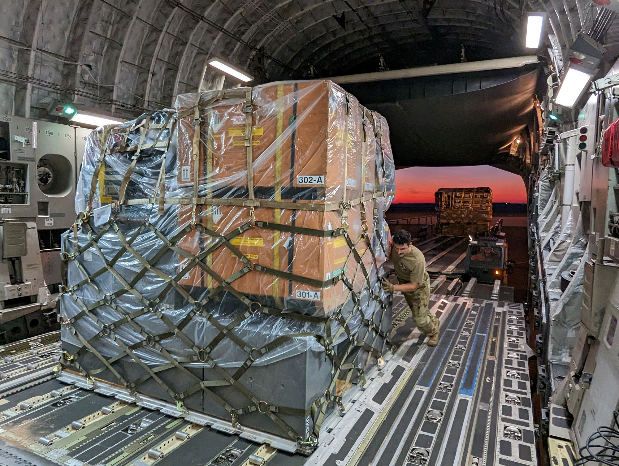 In this handout photo released on February 7, equipment and supplies for the Urban Search and Rescue team from Fairfax, Virginia, and USAID are loaded onto a transport plane to help in support operations for victims of the earthquake in Turkey, at Dover Air Force Base, Delaware.