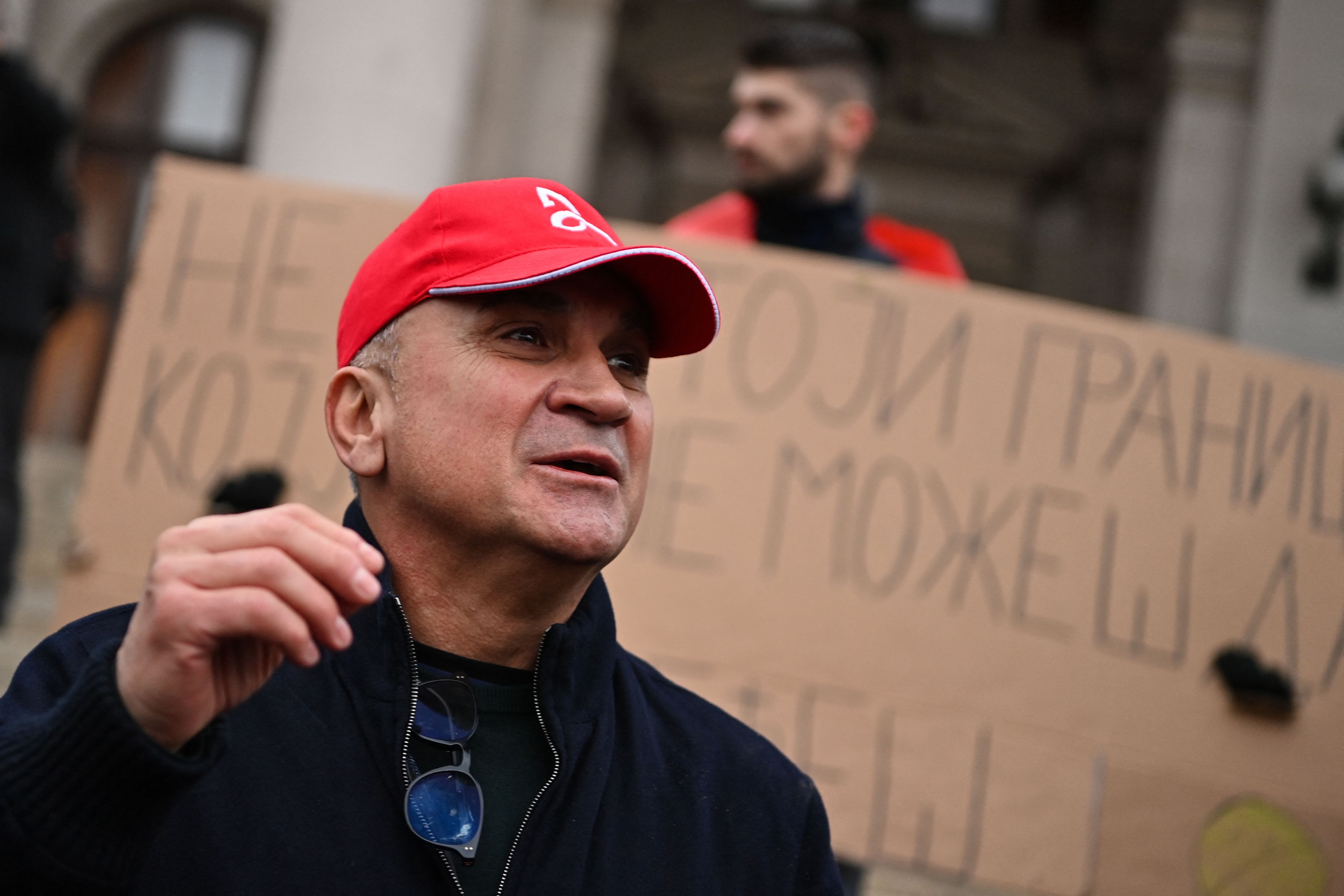 Srdan Djokovic, father of Serbian tennis player Novak Djokovic, attends a rally in front of Serbia's National Assembly in Belgrade, on January 6, 2022.