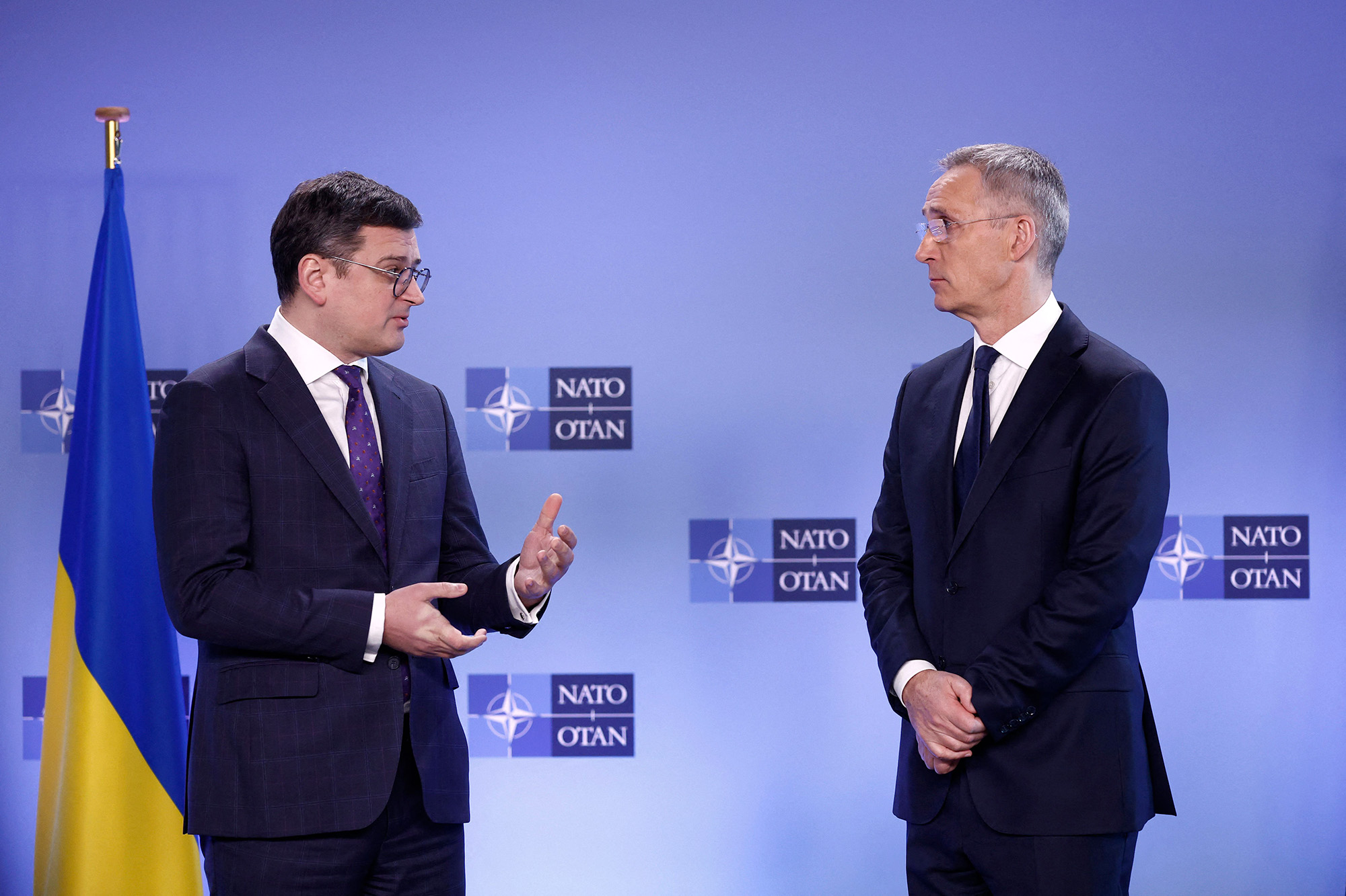 NATO Secretary General Jens Stoltenberg, right, and Ukrainian Foreign Affairs Minister Dmytro Kuleba give joint statements on the sidelines of a NATO meeting, at the NATO headquarters in Brussels, Belgium, on April 4.