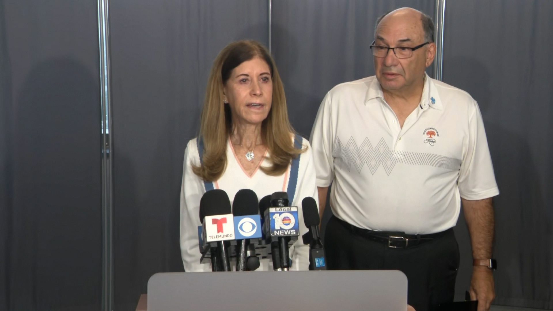 Linda Beigel Schulman and Michael Schulman speak at a press conference on Thursday, October 13. 