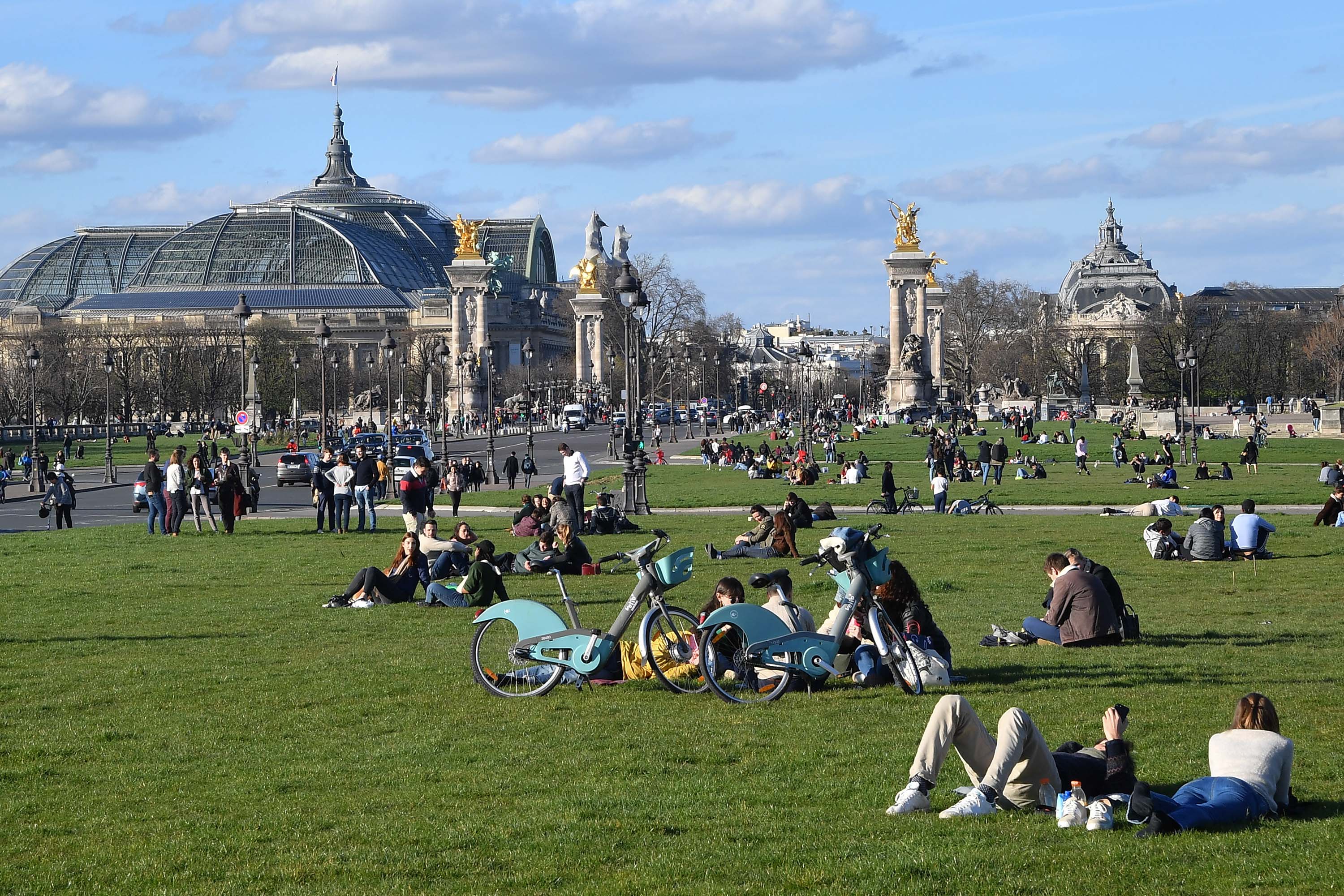 People gather at the grounds of Les Invalides in Paris, France, on March 15.