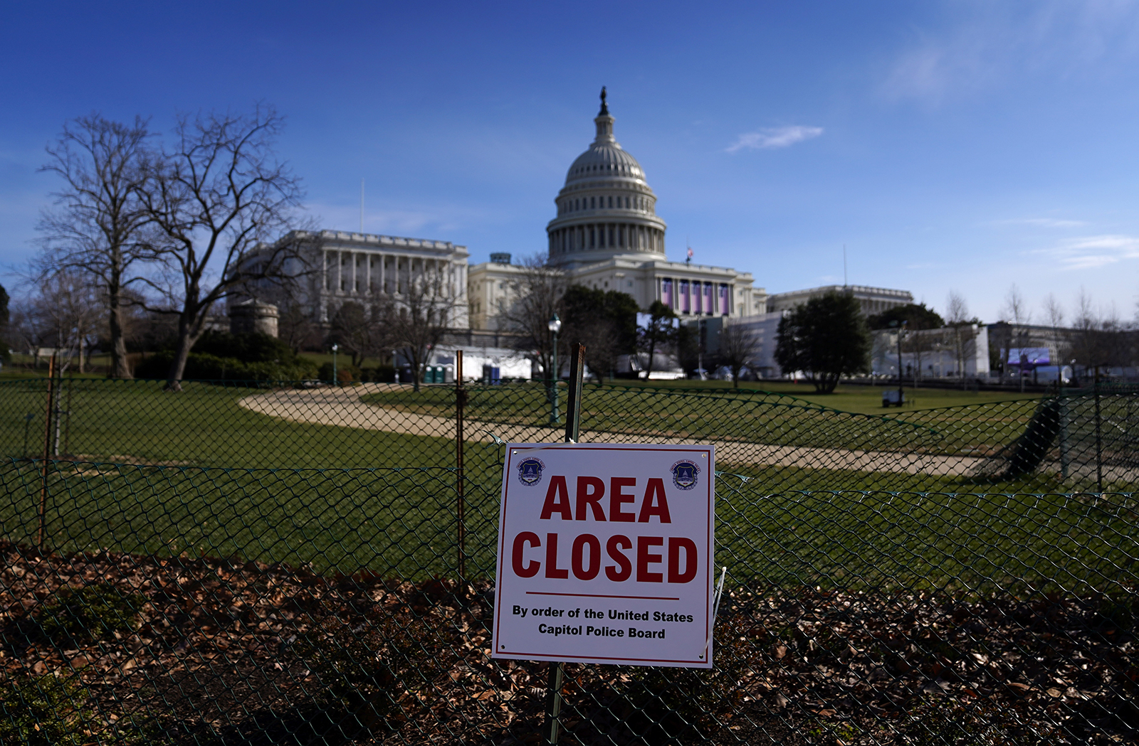 An area closed sign is posted on fencing outside the US Capitol on January 16, in Washington, DC. 