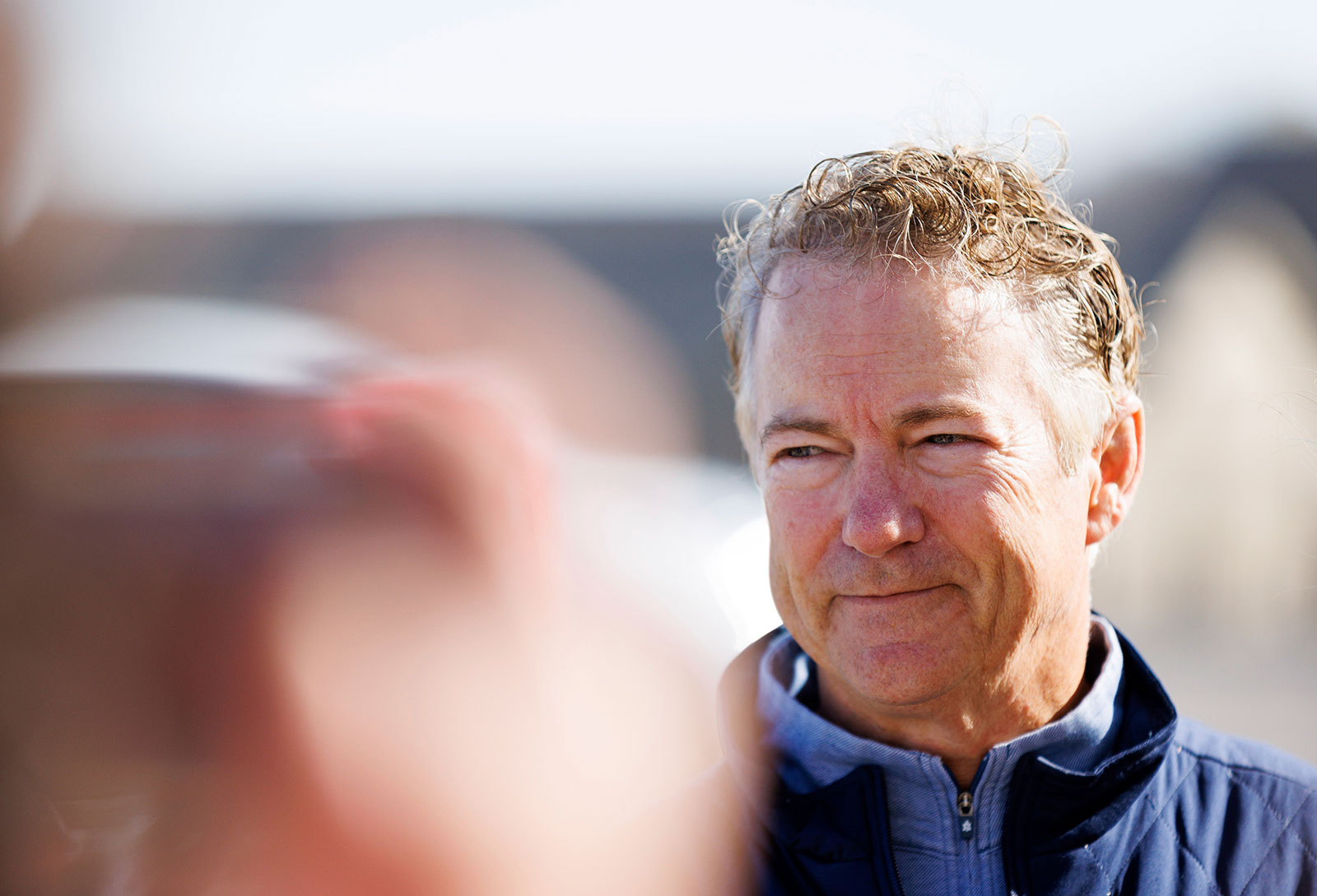 Sen. Rand Paul answers questions from reporters after voting in Bowling Green, Kentucky, on Tuesday. 