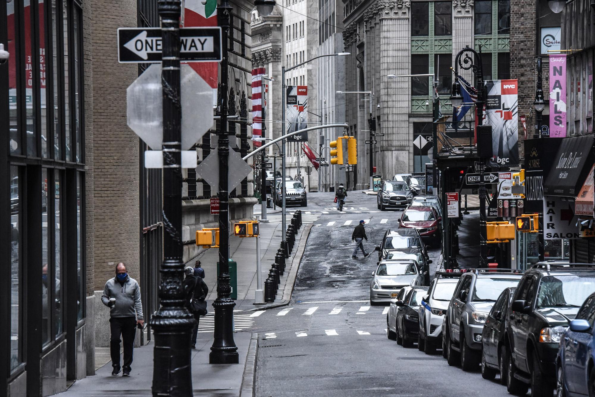 An empty street and closed businesses are seen on April 30 in the Financial District in New York City. 