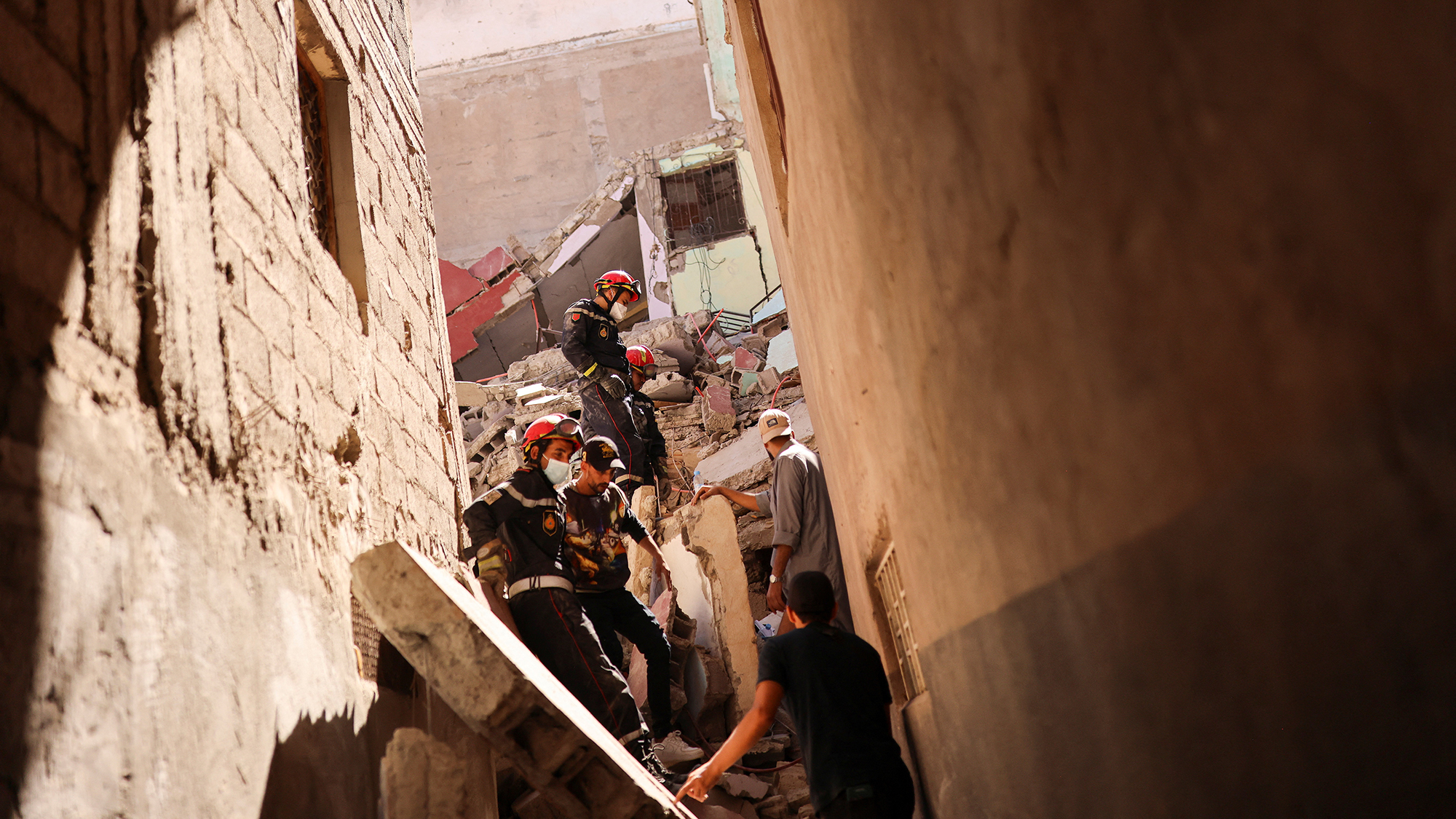 Emergency workers search a destroyed building in Amizmiz, Morocco on September 10. 