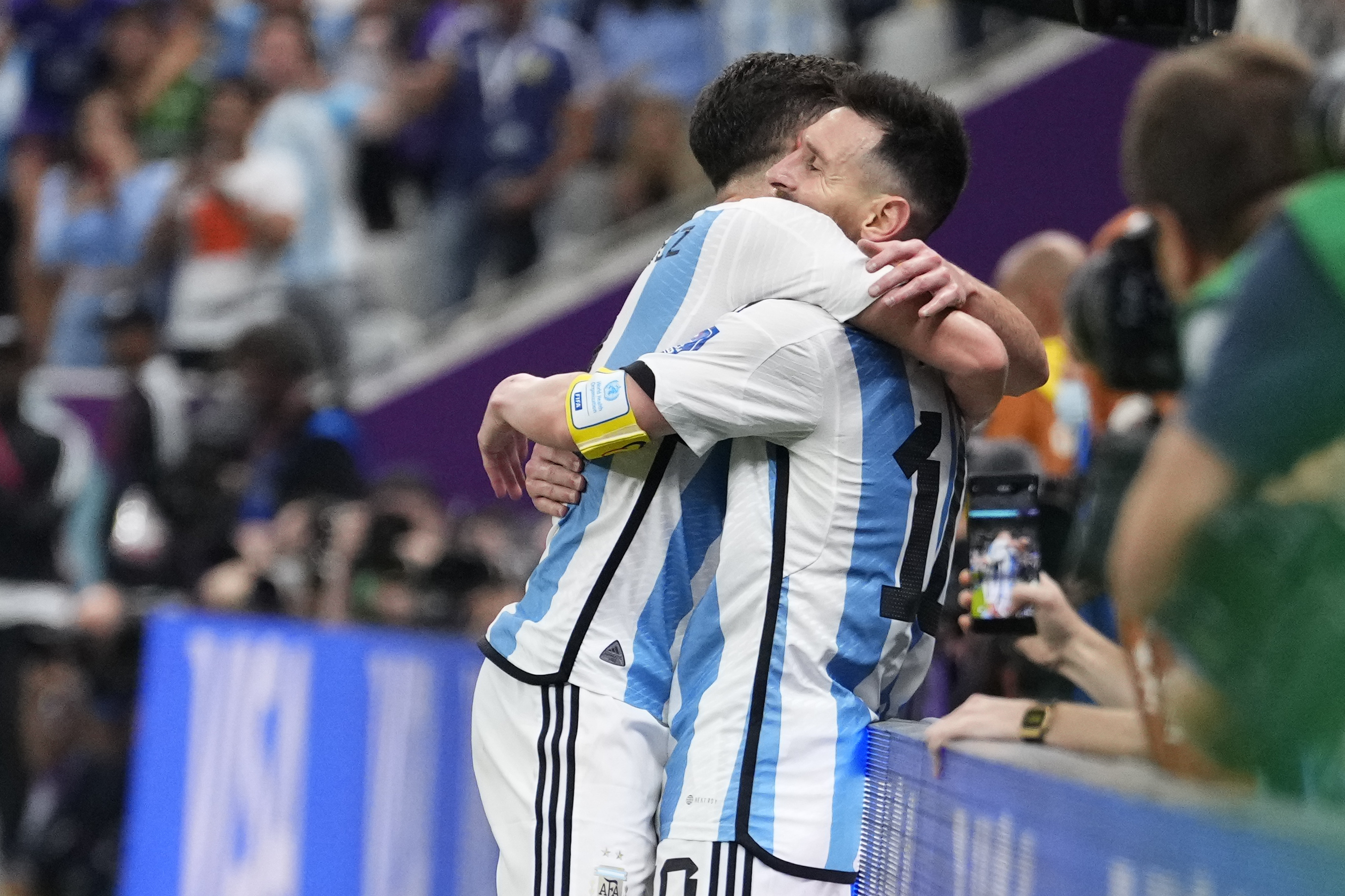 Julián Álvarez, left, and Lionel Messi celebrate Argentina's third goal against Croatia at Lusail Stadium on Tuesday.