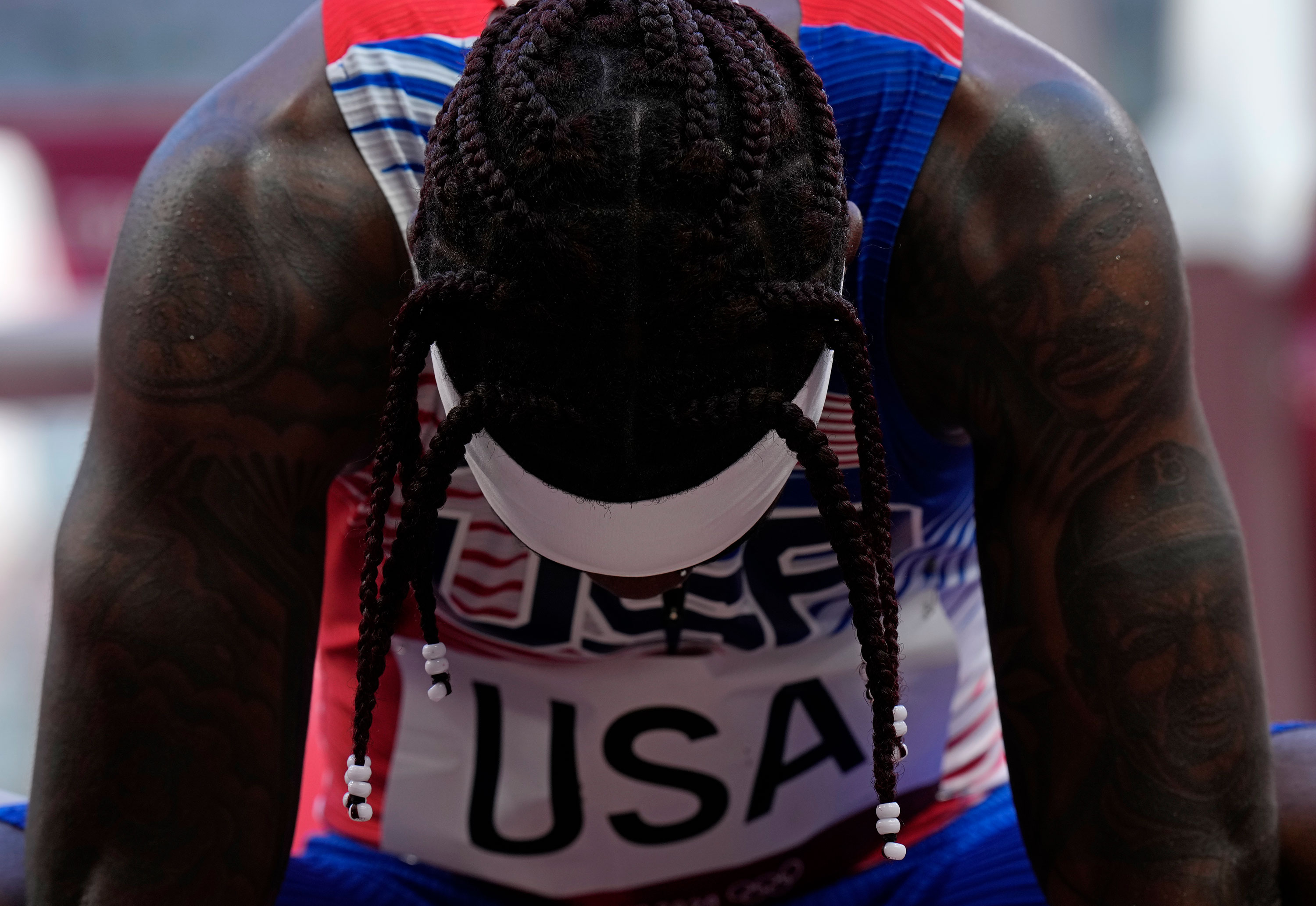 American Cravon Gillespie reacts after the United States finished sixth in a semifinal of the 4x100 meters relay on Thursday.