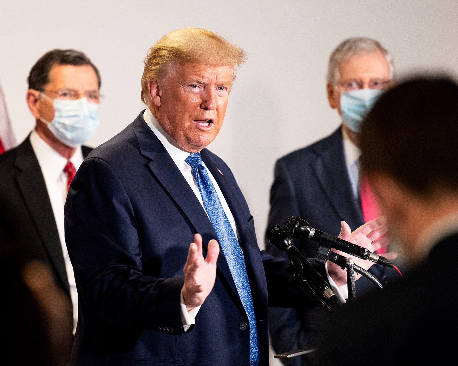 President Trump speaks with the press in Washington on Tuesday.