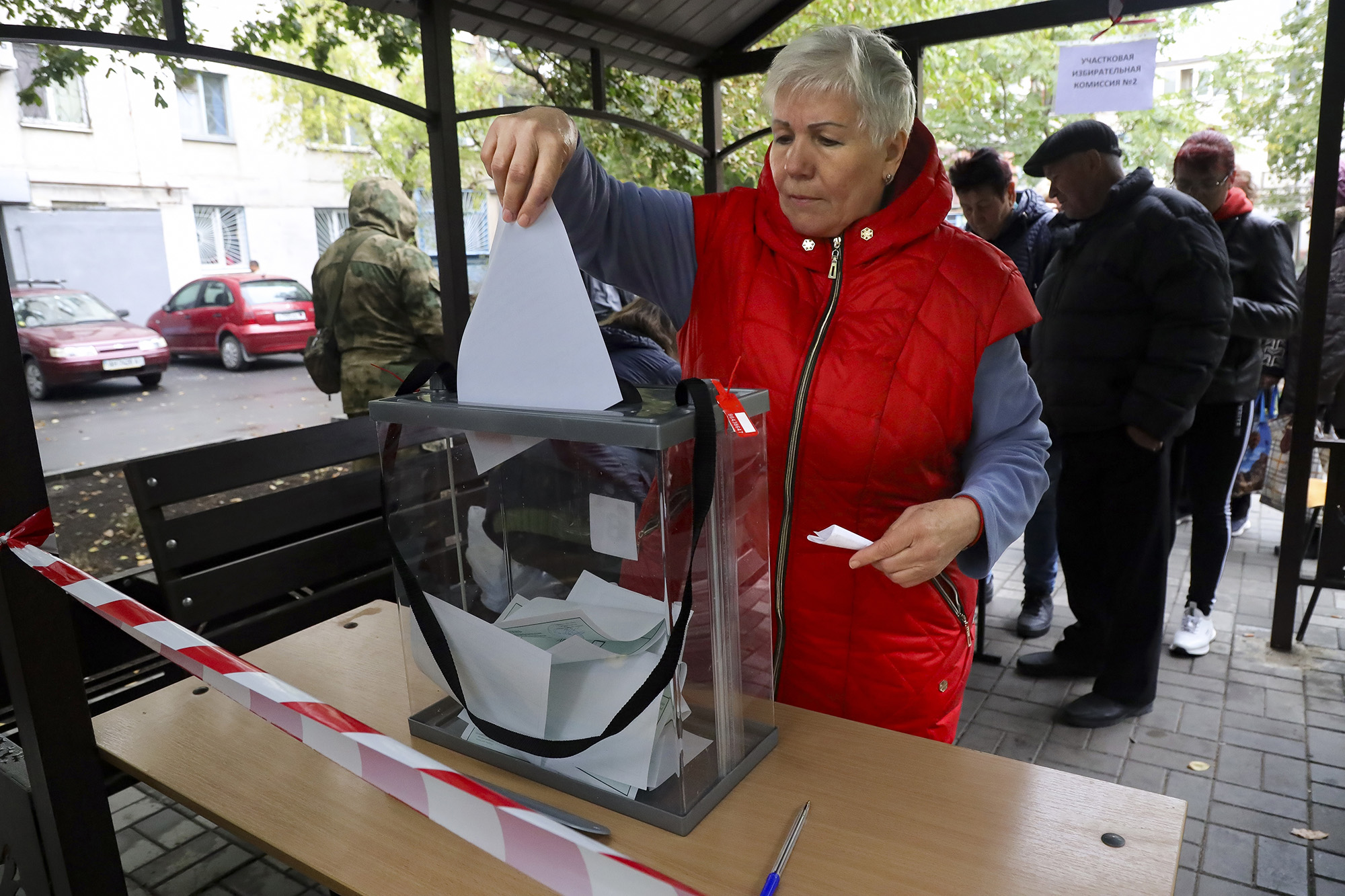 A woman votes during a referendum in a mobile polling station in Mariupol, Donetsk People's Republic, Ukraine, on September 23.