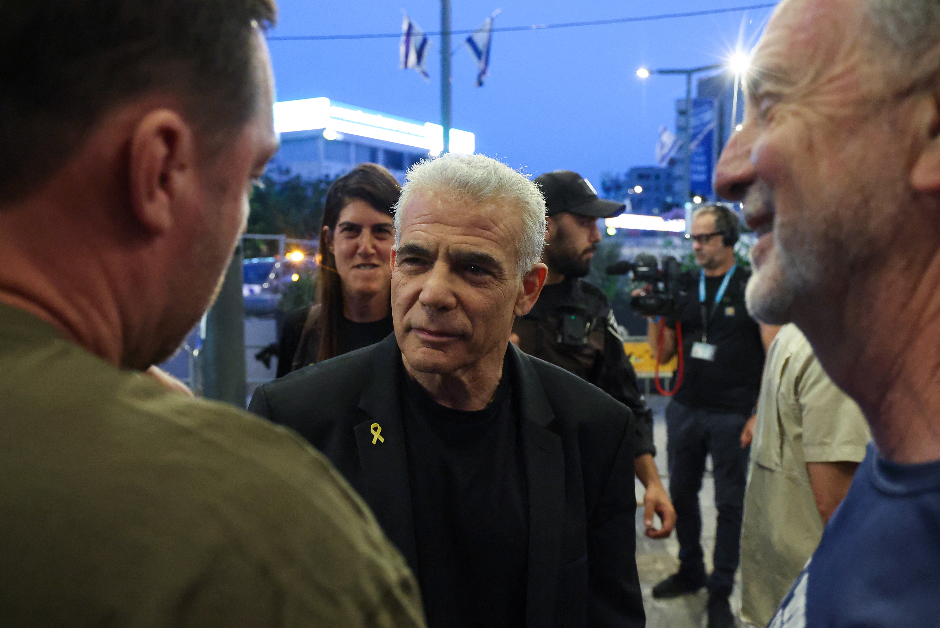 Israeli opposition leader Yair Lapid attends an anti-government demonstration in Tel Aviv, Israel, on May 18.