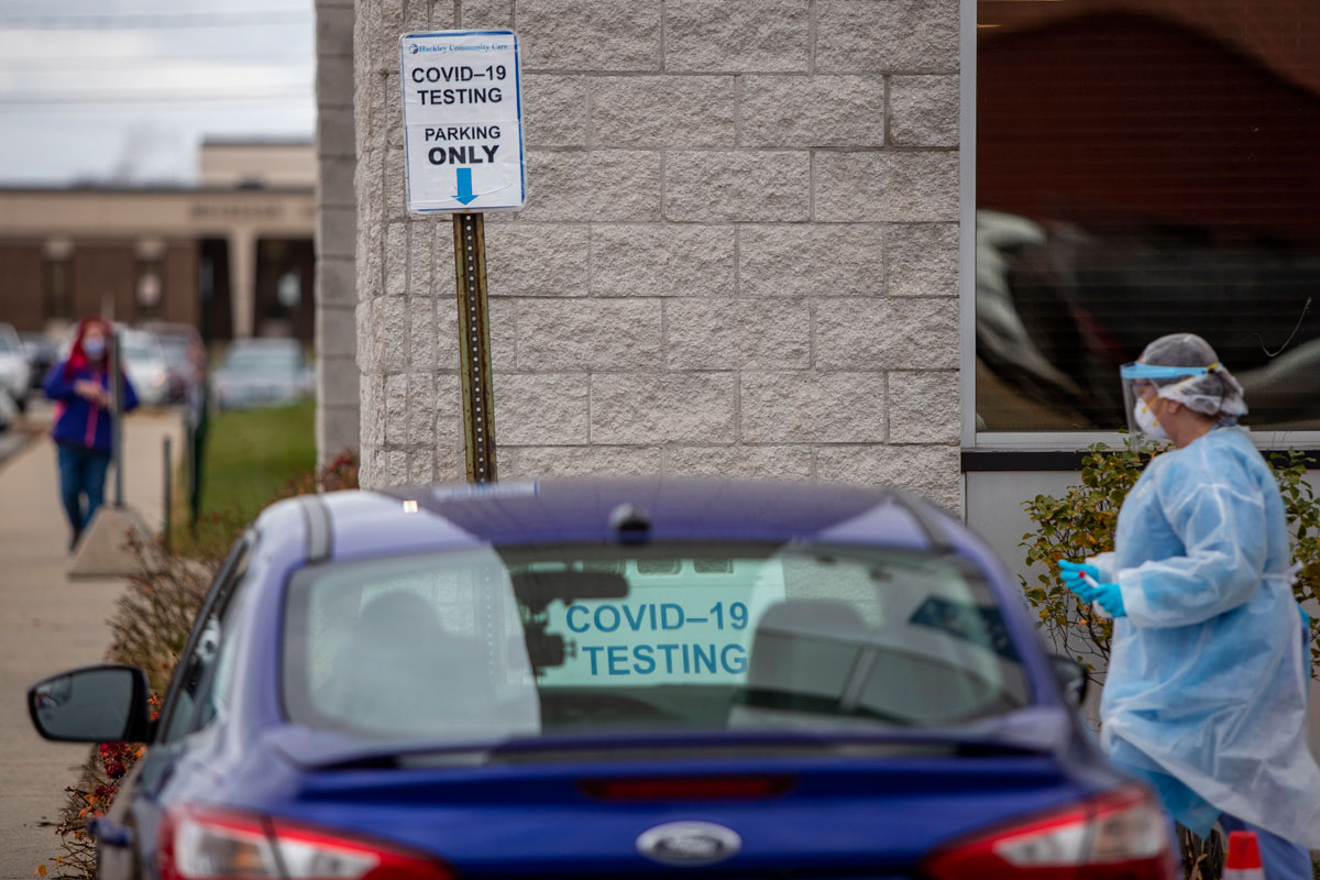 A nurse is seen at the Hackley Community Care Covid-19 curbside testing site in Muskegon Heights, Michigan on November 13.