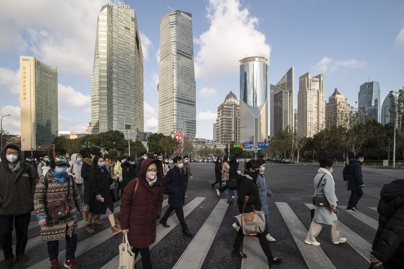 Pedestrians in Pudong's Lujiazui Financial District in Shanghai, China, on January 3.
