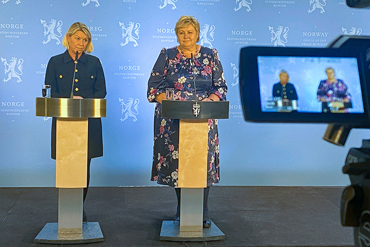 Norway's Prime Minister Erna Solberg, right, and Norway's Minister of Justice Monica Mæland hold a press conference after a man armed with bow killed several people before he was arrested by police in Kongsberg, Norway on October 13.