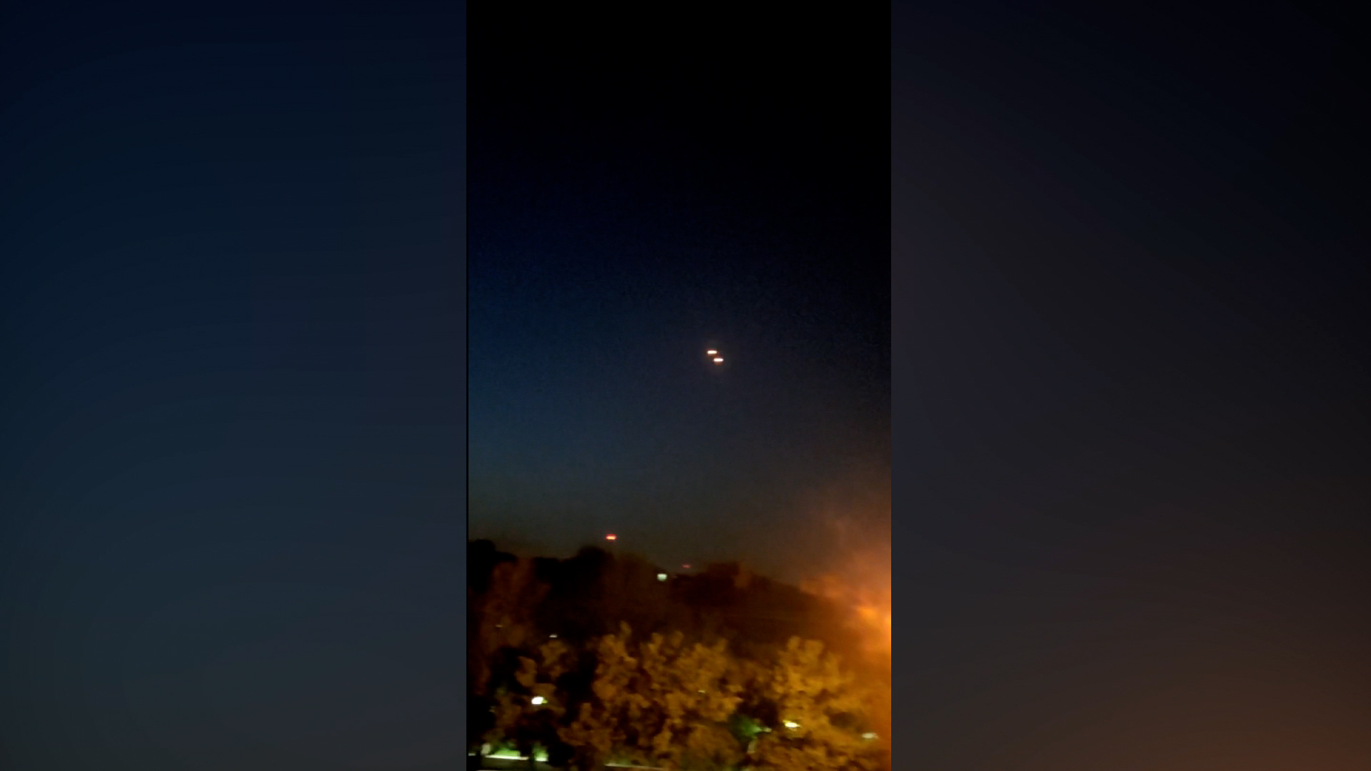 Flashes in the sky of Isfahan, Iran following reports of explosions.