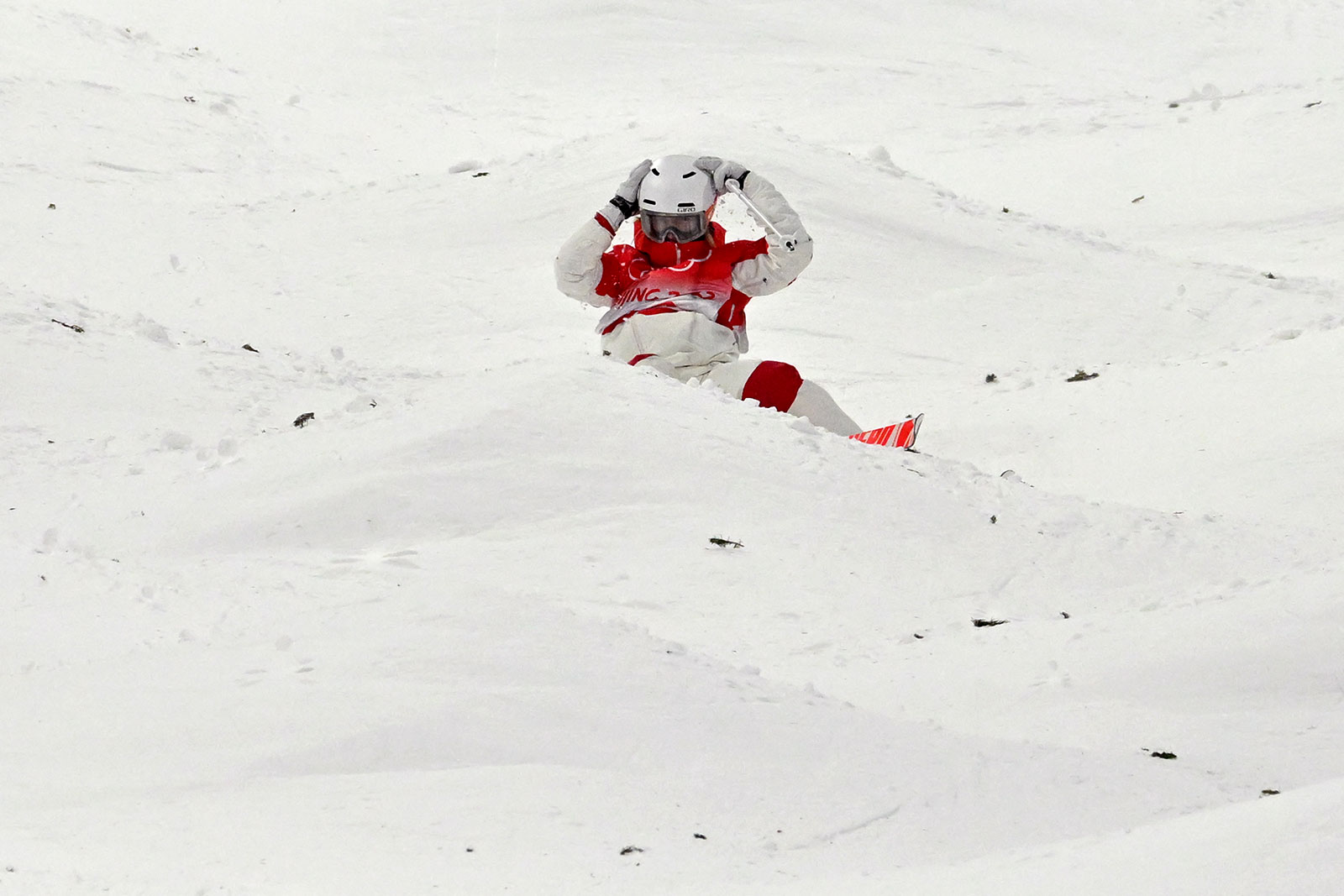 Canada's Justine Dufour-Lapointe crashes out during the women's moguls on February 6.