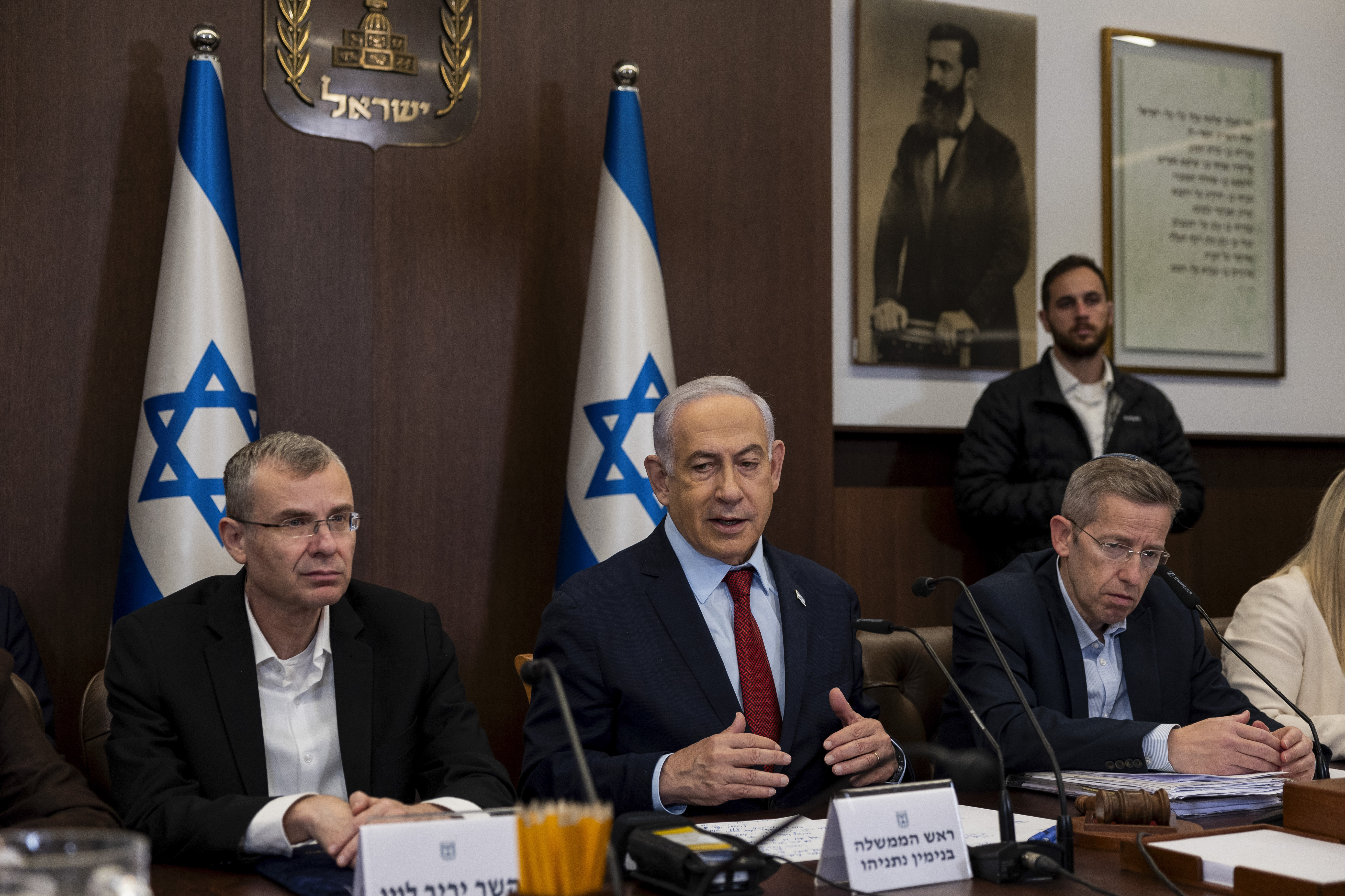 Prime Minister Benjamin Netanyahu, center, speaks during a cabinet meeting in Jerusalem, on December 10. 