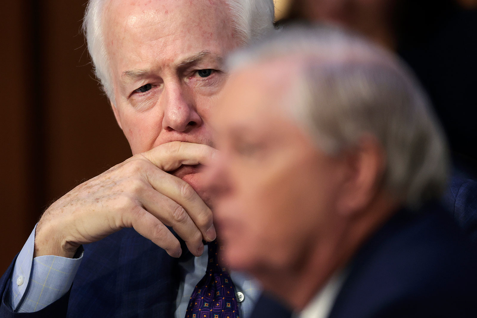 Sen. John Cornyn watches as Sen. Lindsey Graham questions Supreme Court nominee Judge Ketanji Brown Jackson during her confirmation hearing on Tuesday. 
