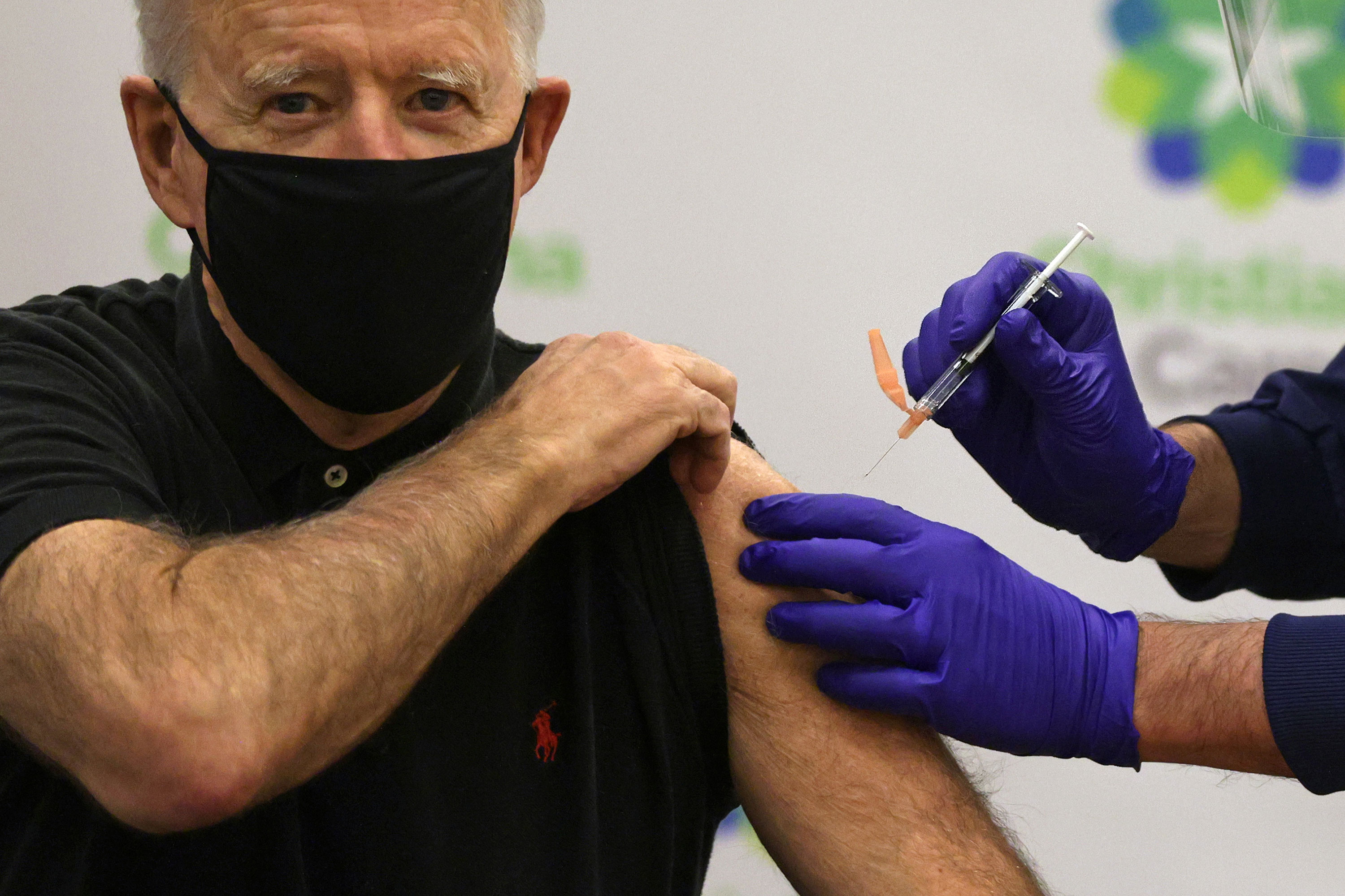 President Joe Biden receives his second dose of the Pfizer Covid-19 vaccine on January 11 in Newark, Delaware.
