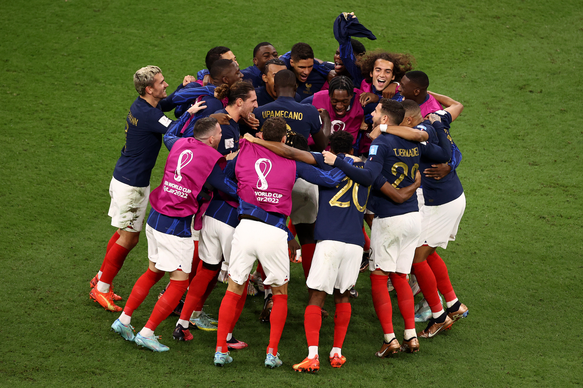 France celebrates at 2-1 over England at Al-Bayt Stadium.