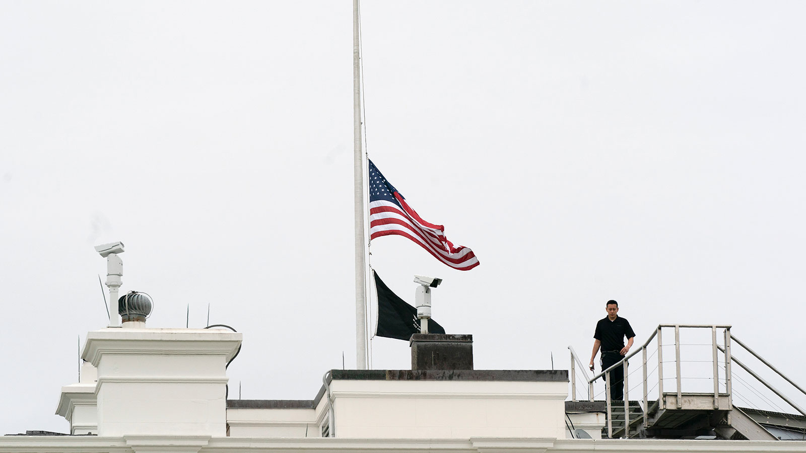An American flag flies at half-staff at the White House on May 24, in Washington, DC.