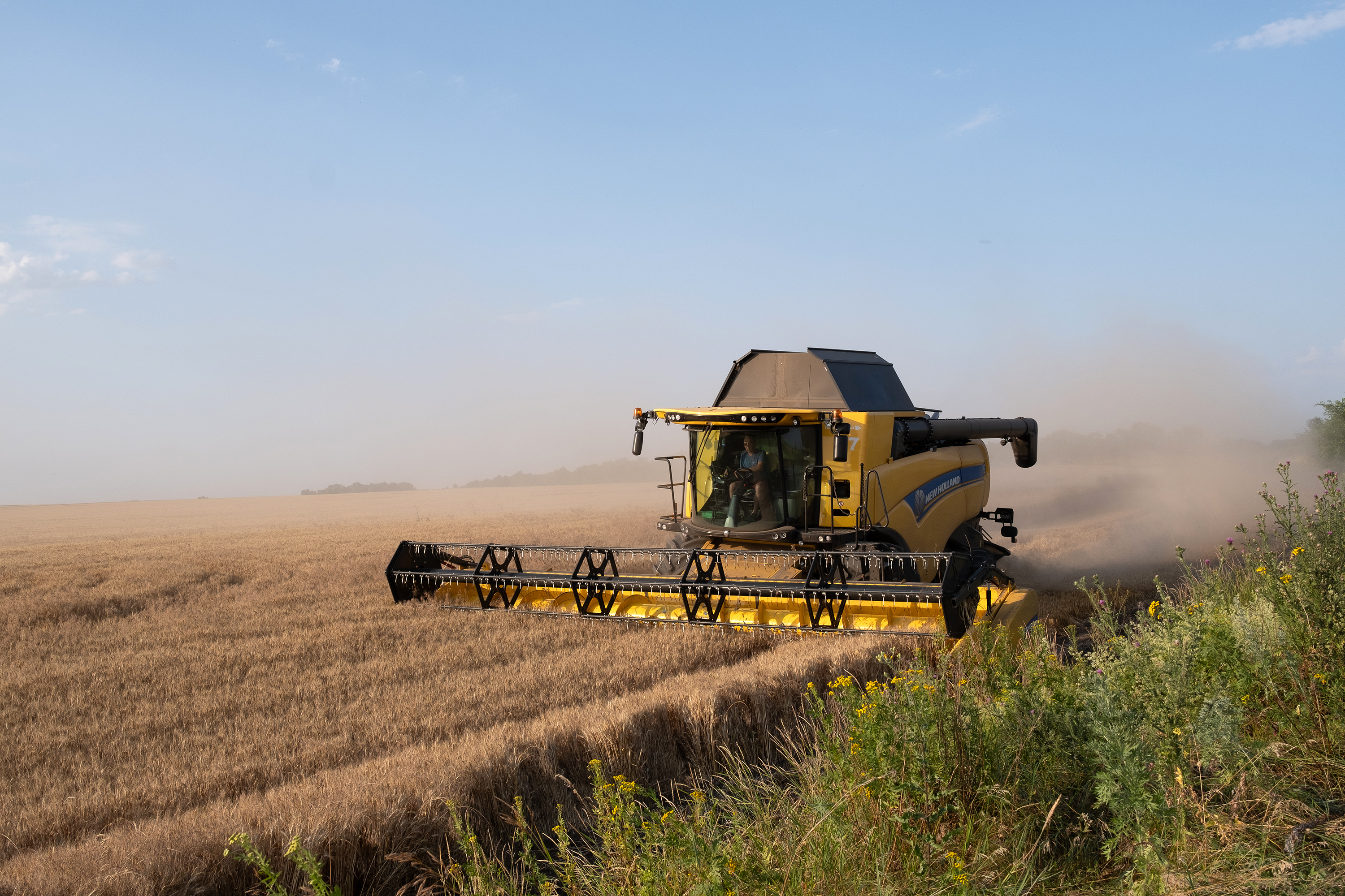 A harvester works on a wheat field in Prymorske, Ukraine, on July 5. 