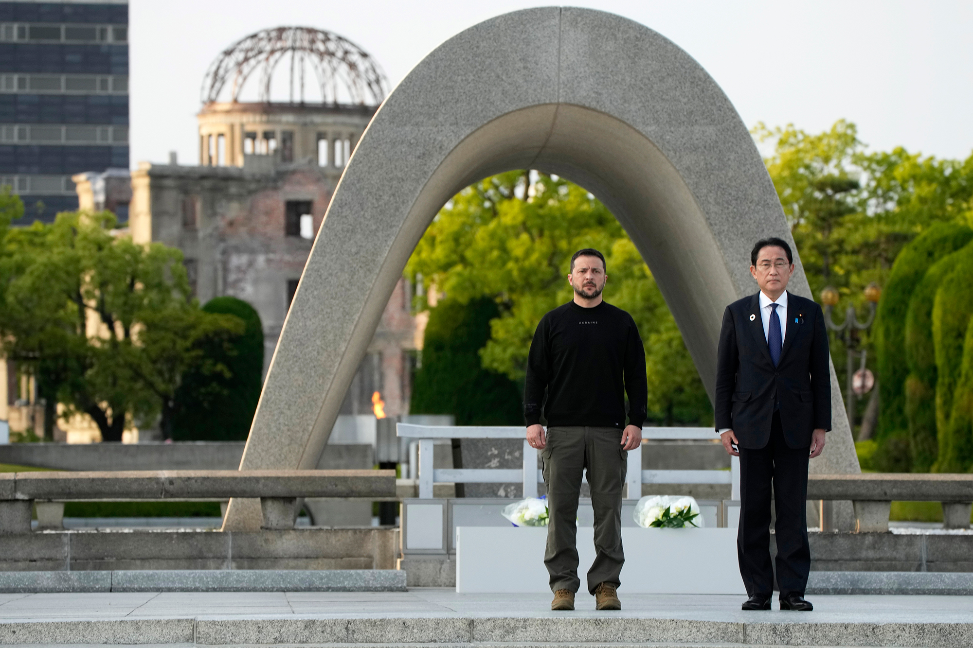 Ukrainian President Volodymyr Zelensky and Japanese Prime Minister Fumio Kishida visit the cenotaph for atomic bomb victims in Hiroshima, Japan, on Sunday, May 21. 