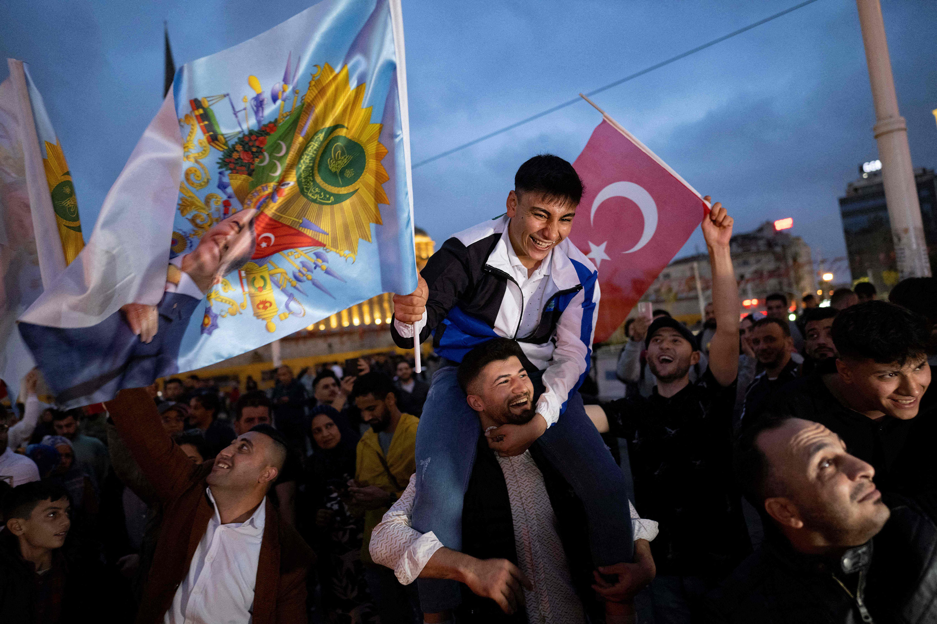 Supporters of Turkish President Recep Tayyip Erdogan celebrate in Istanbul's Taksim Square on May 28. 