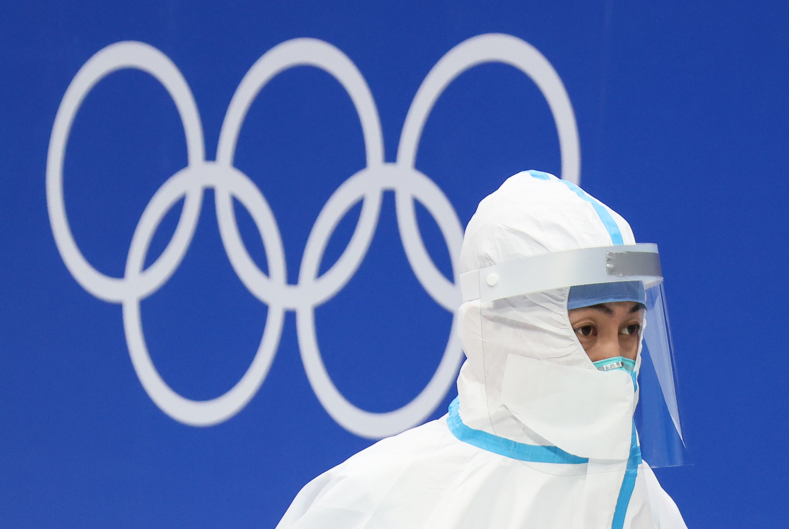 A medical staff in protective gear is seen at the National Indoor Stadium on Feb. 11.