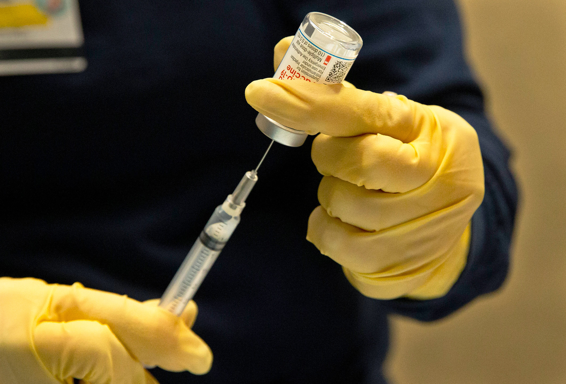 A nurse prepares a dose of Covid-19 vaccine in Houston, Texas, on January 3. 