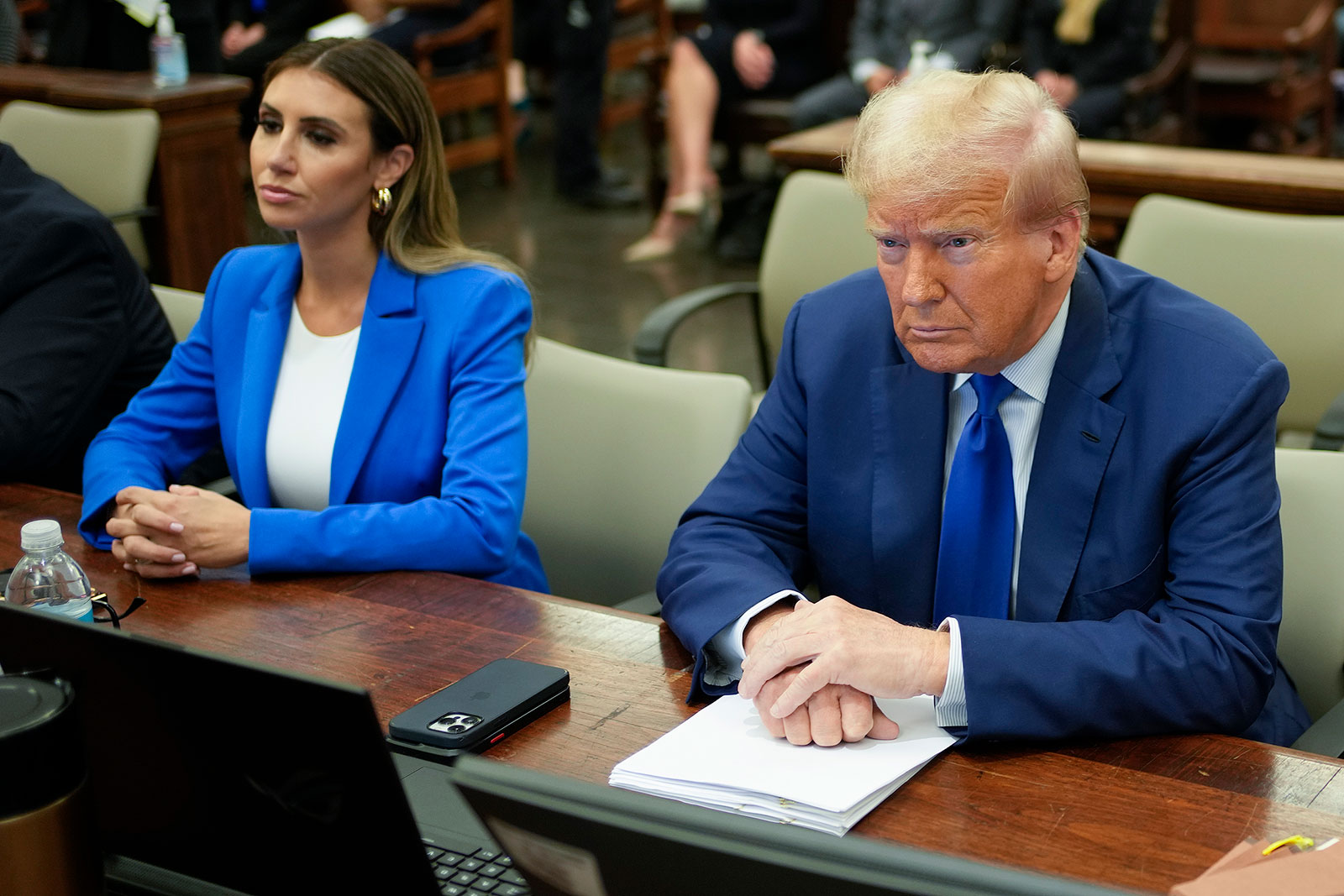 Former President Donald Trump and his attorney Alina Habba wait for the continuation of Trump’s civil business fraud trial in New York on Wednesday.