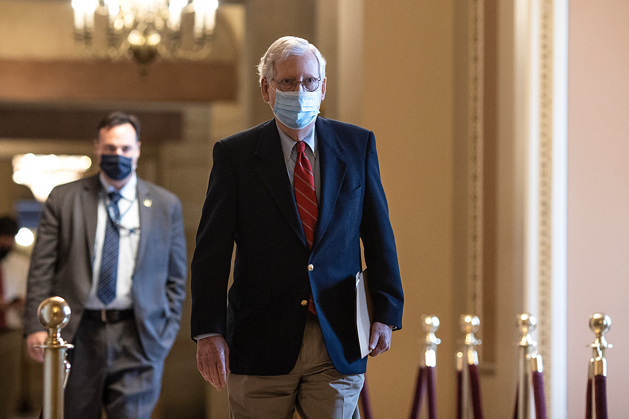Senate Majority Leader Mitch McConnell walks to open up the senate on Capitol Hill on December 20 in Washington, DC. 