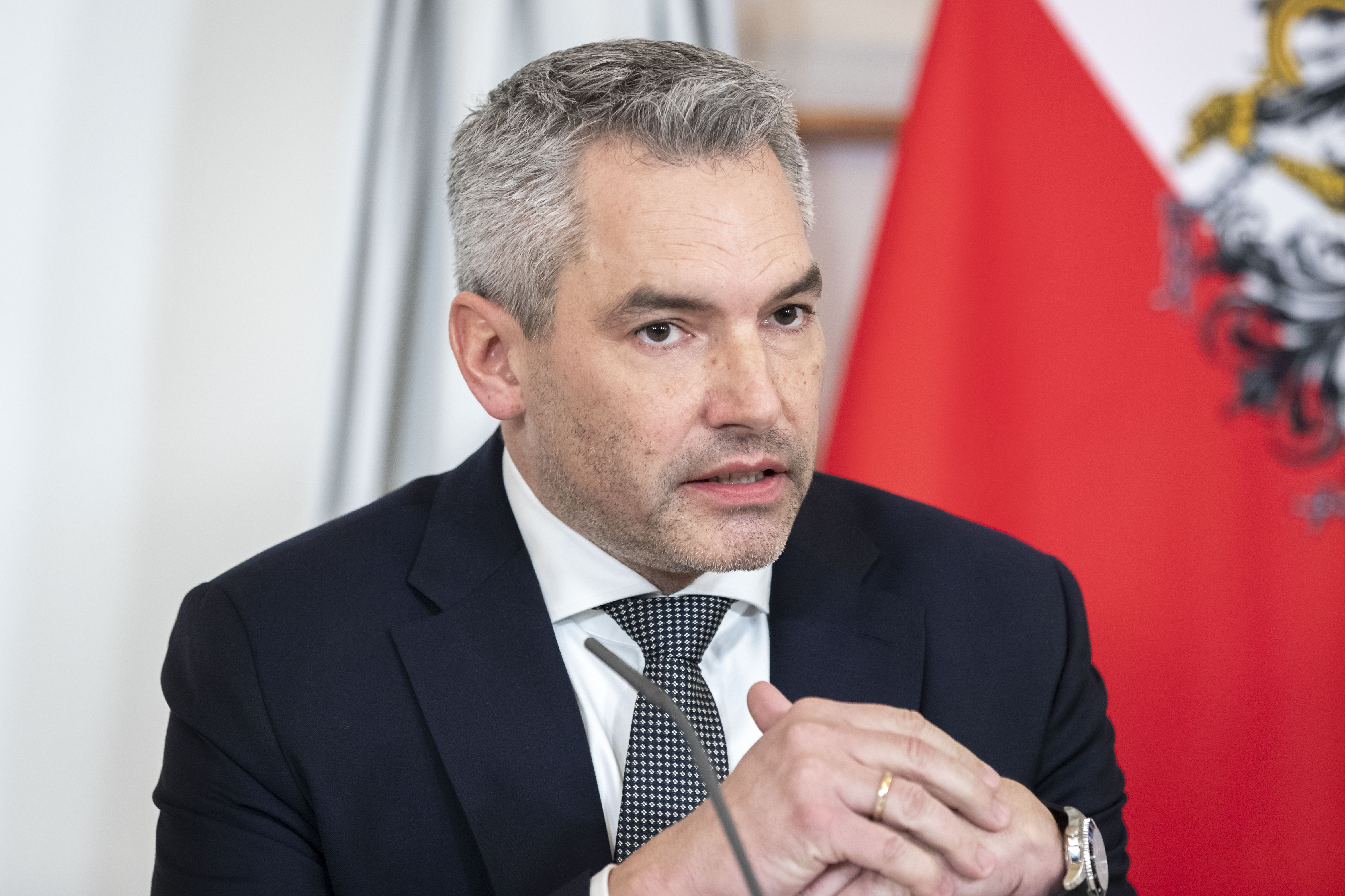 Austrian Chancellor Karl Nehammer presents the new COVID19- regulations at a press conference after a meeting of the federal government in Vienna, Austria, Thursday, Jan. 6, 2022. 