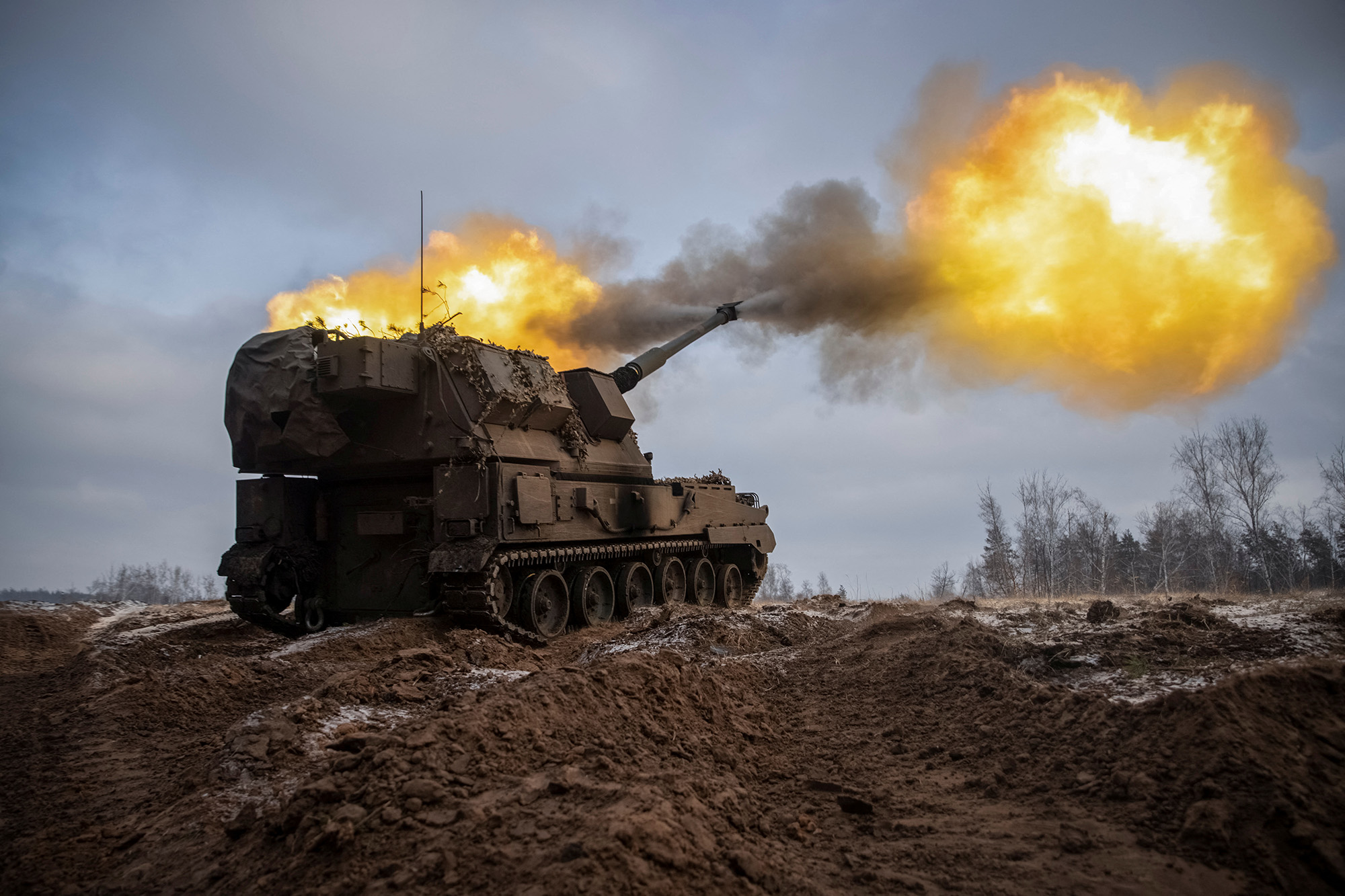 Ukrainian servicemen fire a Polish self-propelled howitzer Krab toward Russian positions on a frontline in Donetsk region, Ukraine, on January 17.
