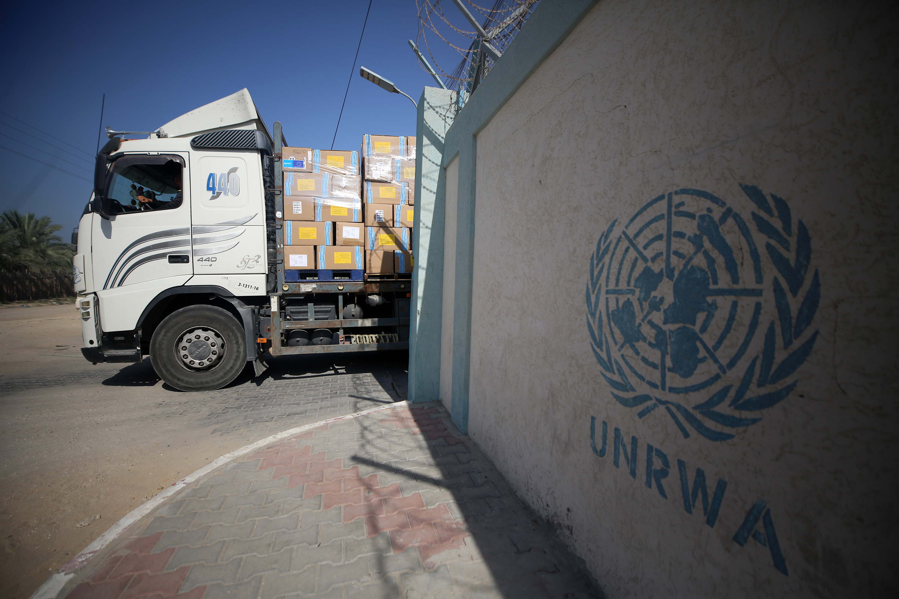 Workers of the United Nations Relief and Works Agency for Palestine Refugees (UNRWA) pack the medical aid and prepare it for distribution to hospitals at a warehouse in Deir Al-Balah, Gaza on October 25.
