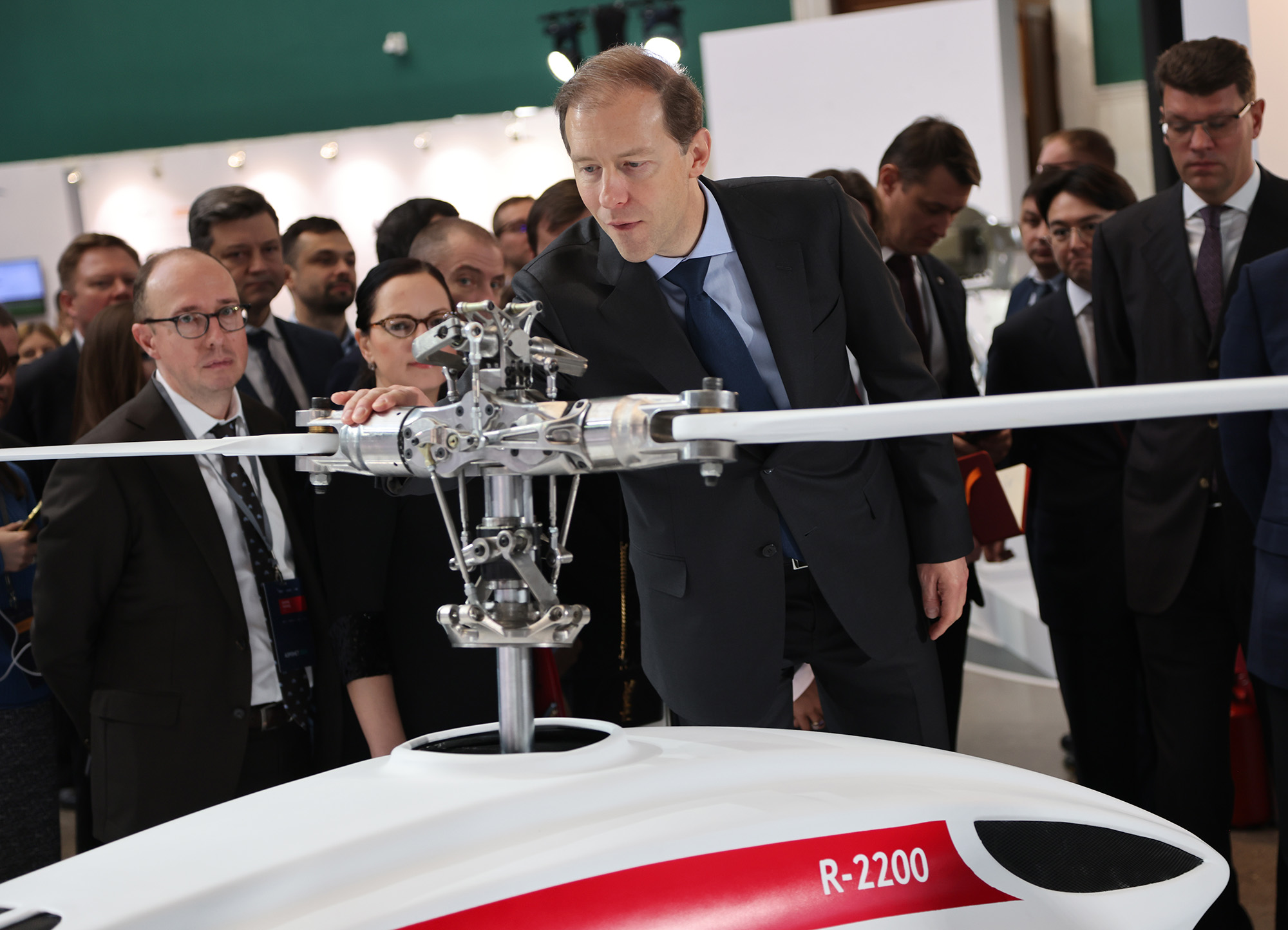 Russian First Deputy Prime Minister Denis Manturov touches the R-2200 helicopter drone while visiting the Aeronet 2035 Drone Exhibition on November 17, in Moscow, Russia. 
