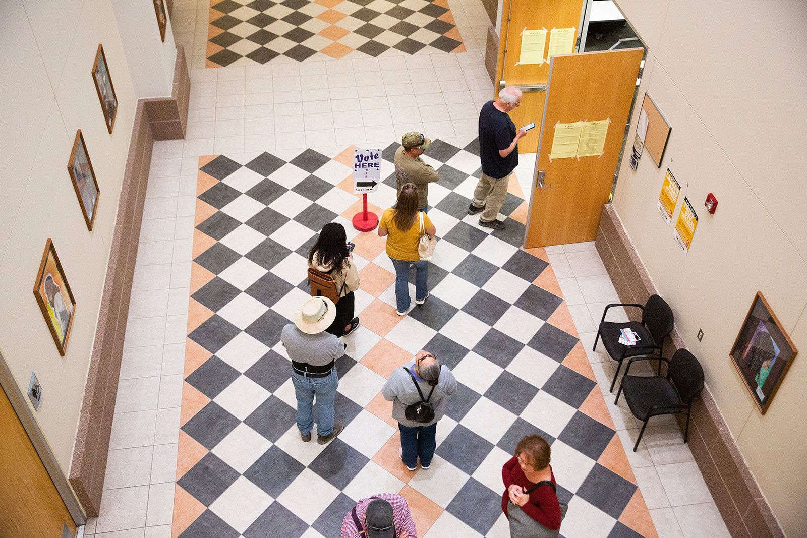 Voters wait in line at the Doña Ana County Government Building in Las Cruces, New Mexico.