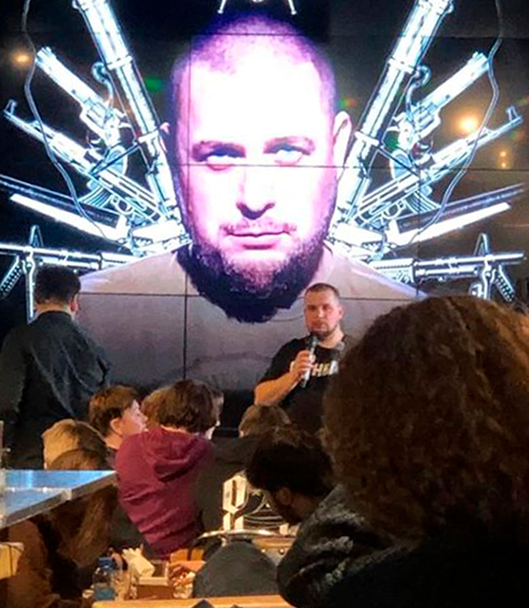 Russian blogger Vladlen Tatarsky speaks during a party at a cafe in St. Petersburg on April 2. 