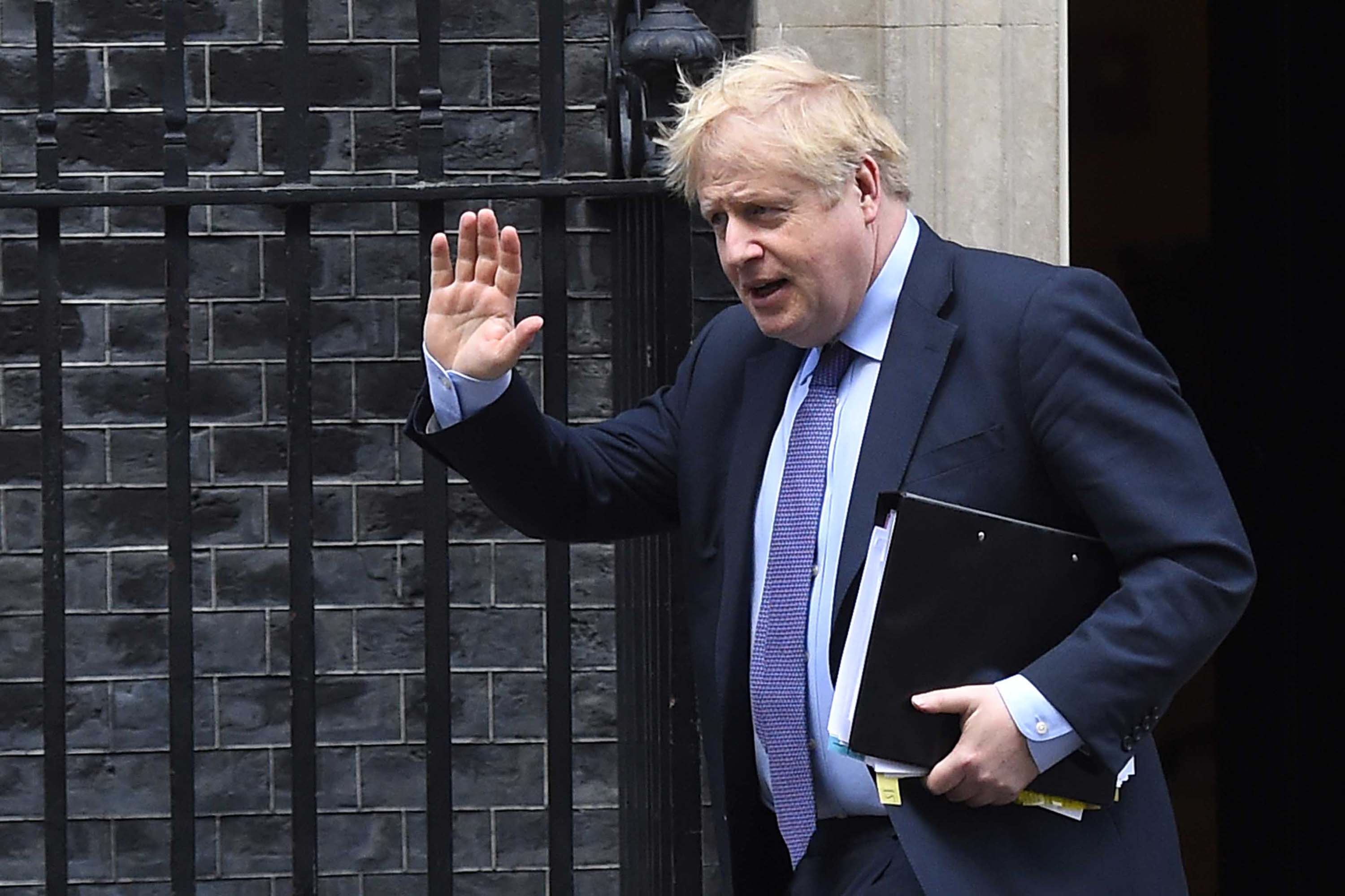 UK Prime Minister Boris Johnson leaves Downing Street in London on February 12. 